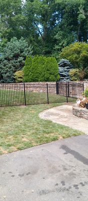 New Black Aluminum fence with matching gates 