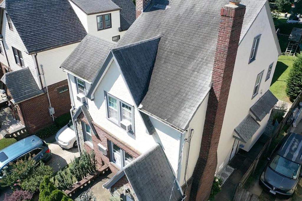 New Roof & Gutters by Island Roofing Inc.