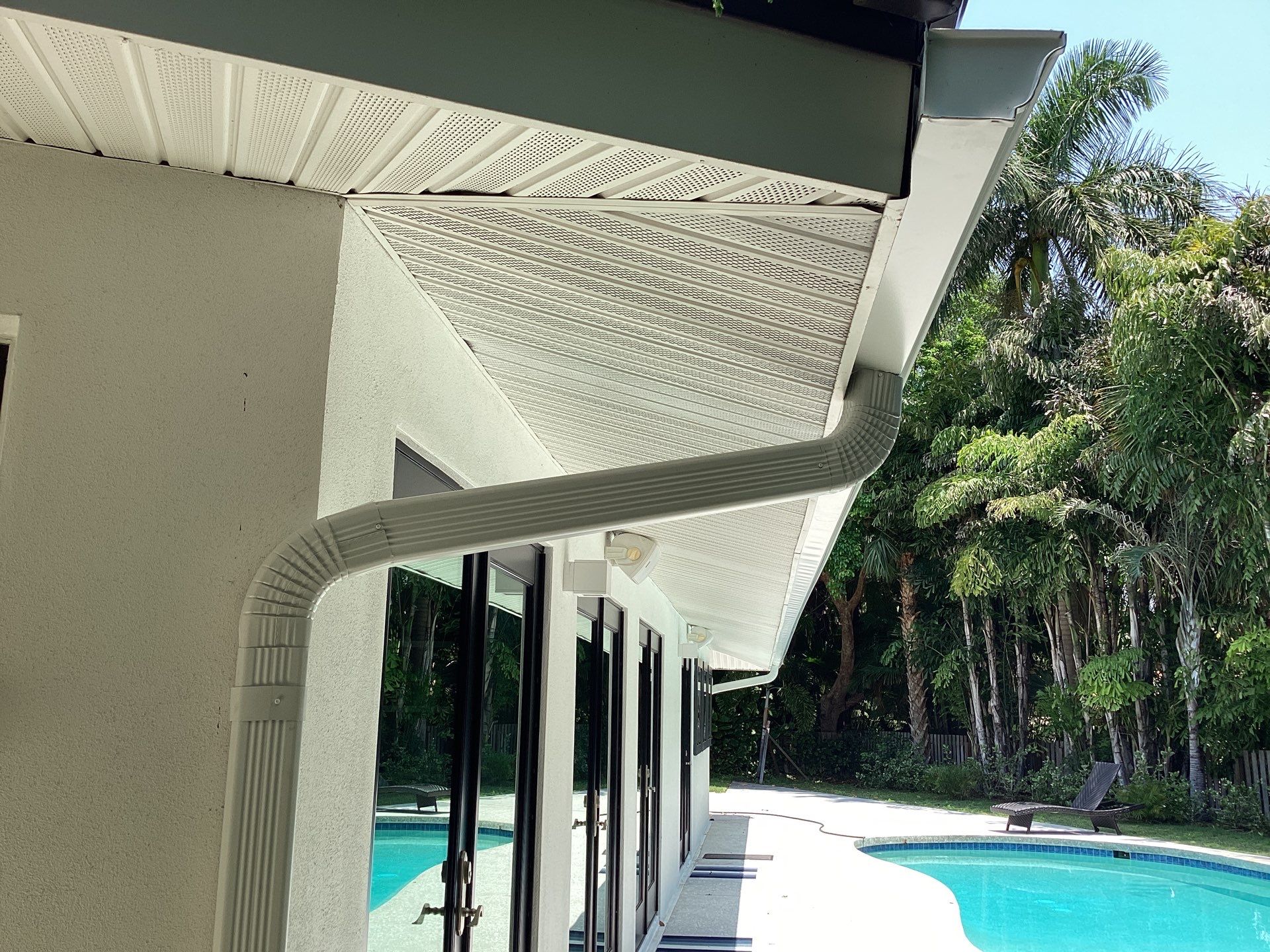White Seamless Gutters and Downspouts in Sarasota FL by Gutter Professors