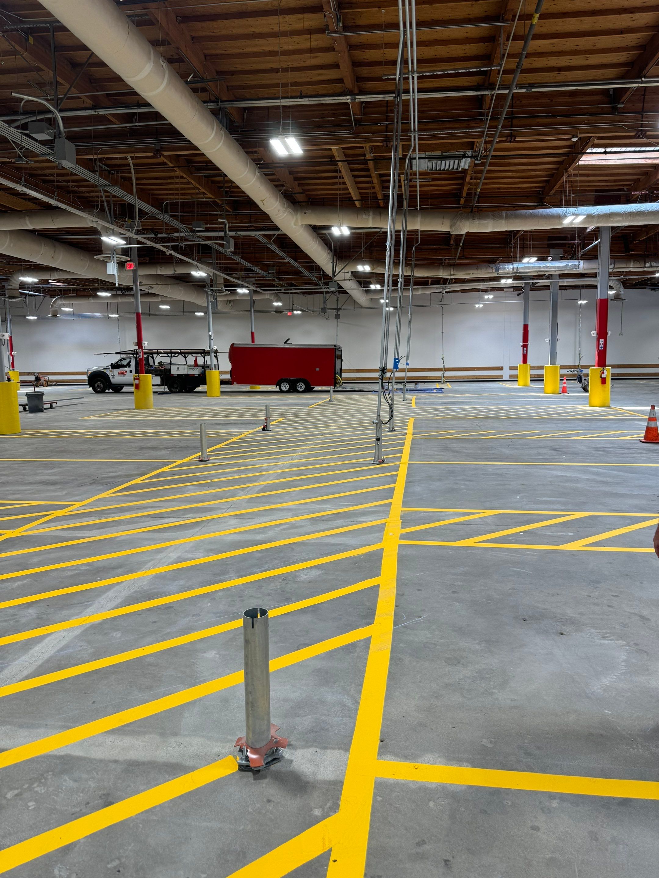 USPS Asphalt Patch Repair, Indoor Parking Lot Sandblast, Outdoor Parking Lot Sealcoating & Indoor/Outdoor Parking Lot Striping  by Jireh Asphalt & Concrete Inc 