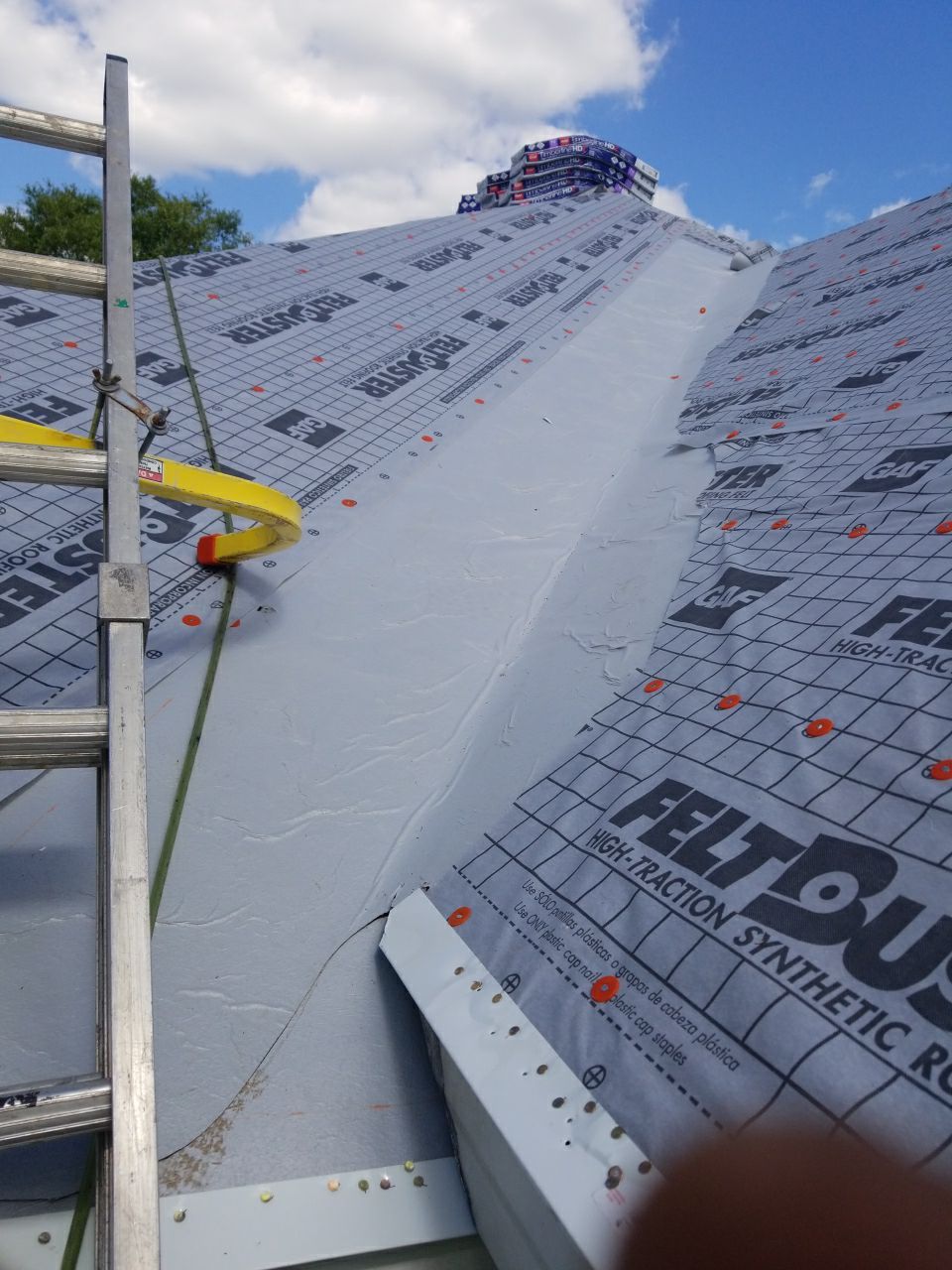 Residential Roofing Installation using Roof Replacement by American Roofing & Construction LLC