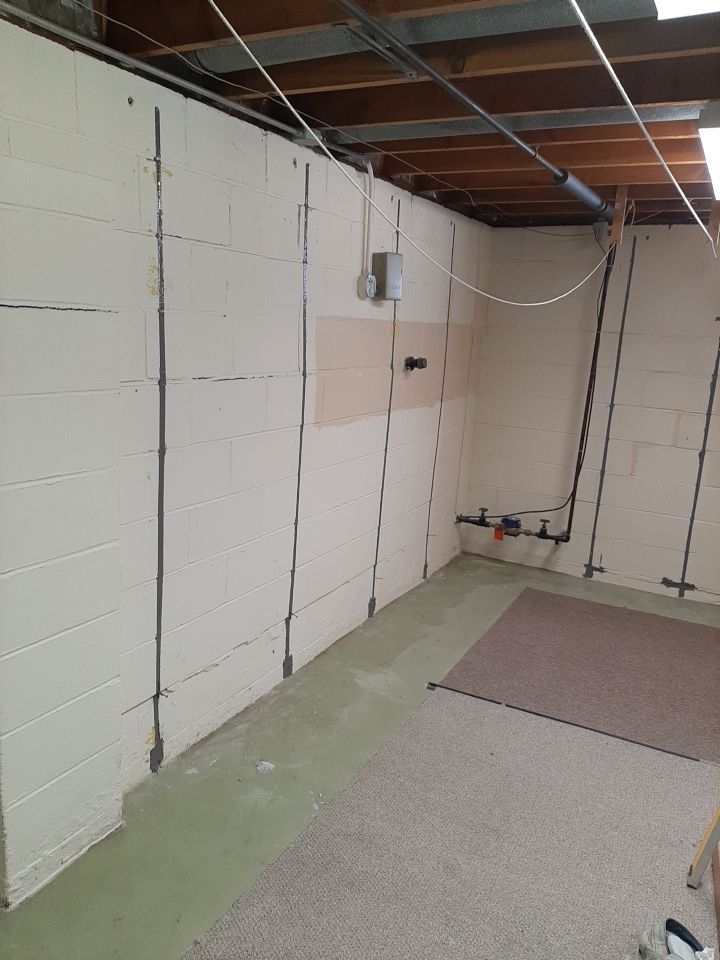 Wall Straightening and Reinforcement using Embedded Fiber Reinforcement by Toledo Basement Repair 
