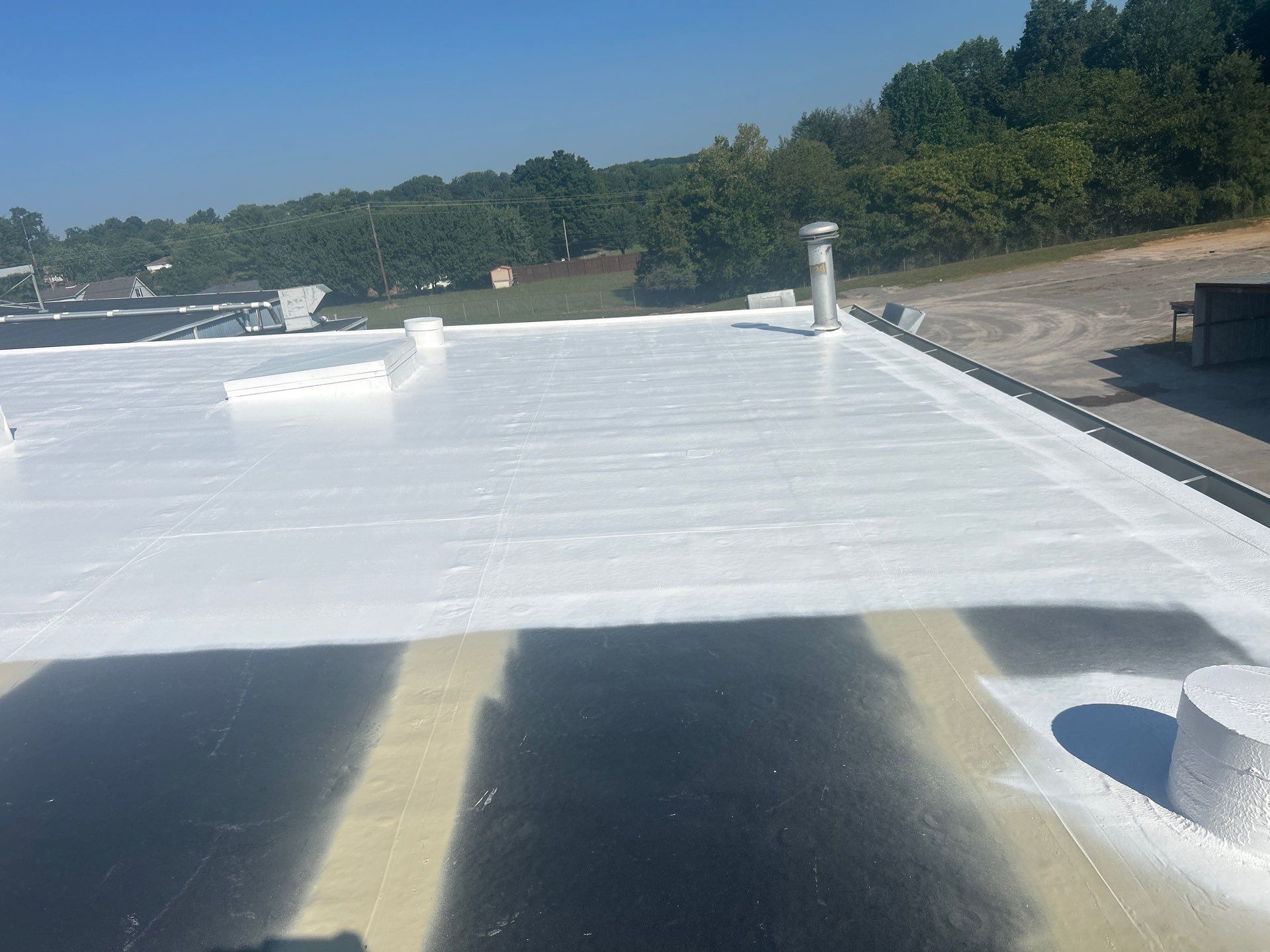 Commercial Roofing Installation using Coatings by Kentucky Commercial Roofing