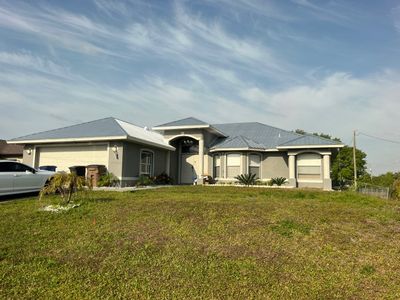 Residential Roofing Installation using Durabull Classic Rib Panel by Durabilis Roofing INC