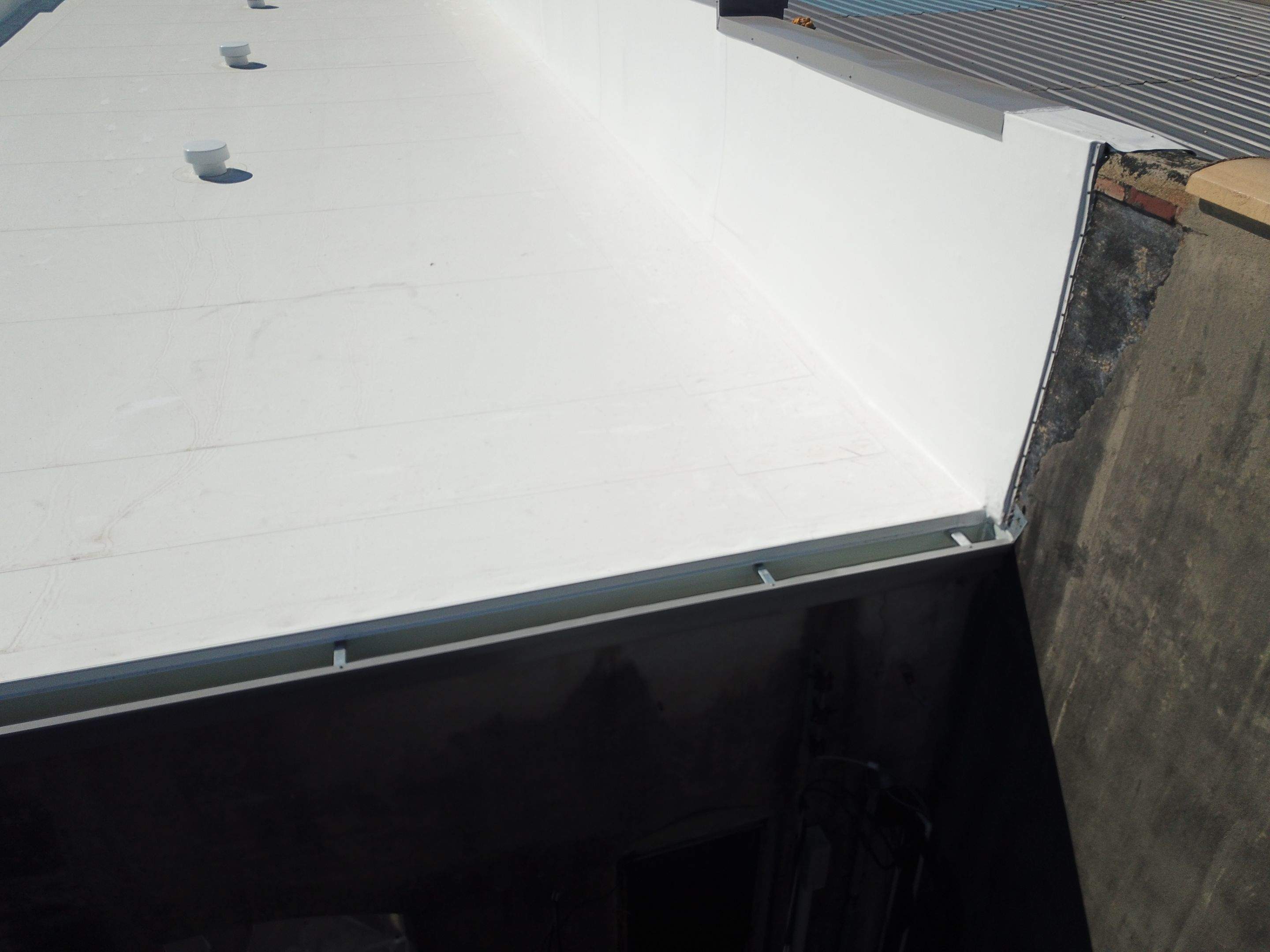 Commercial Roofing Installation in DeQueen, AR, using 50 mil PVC by Hostetler Roofing