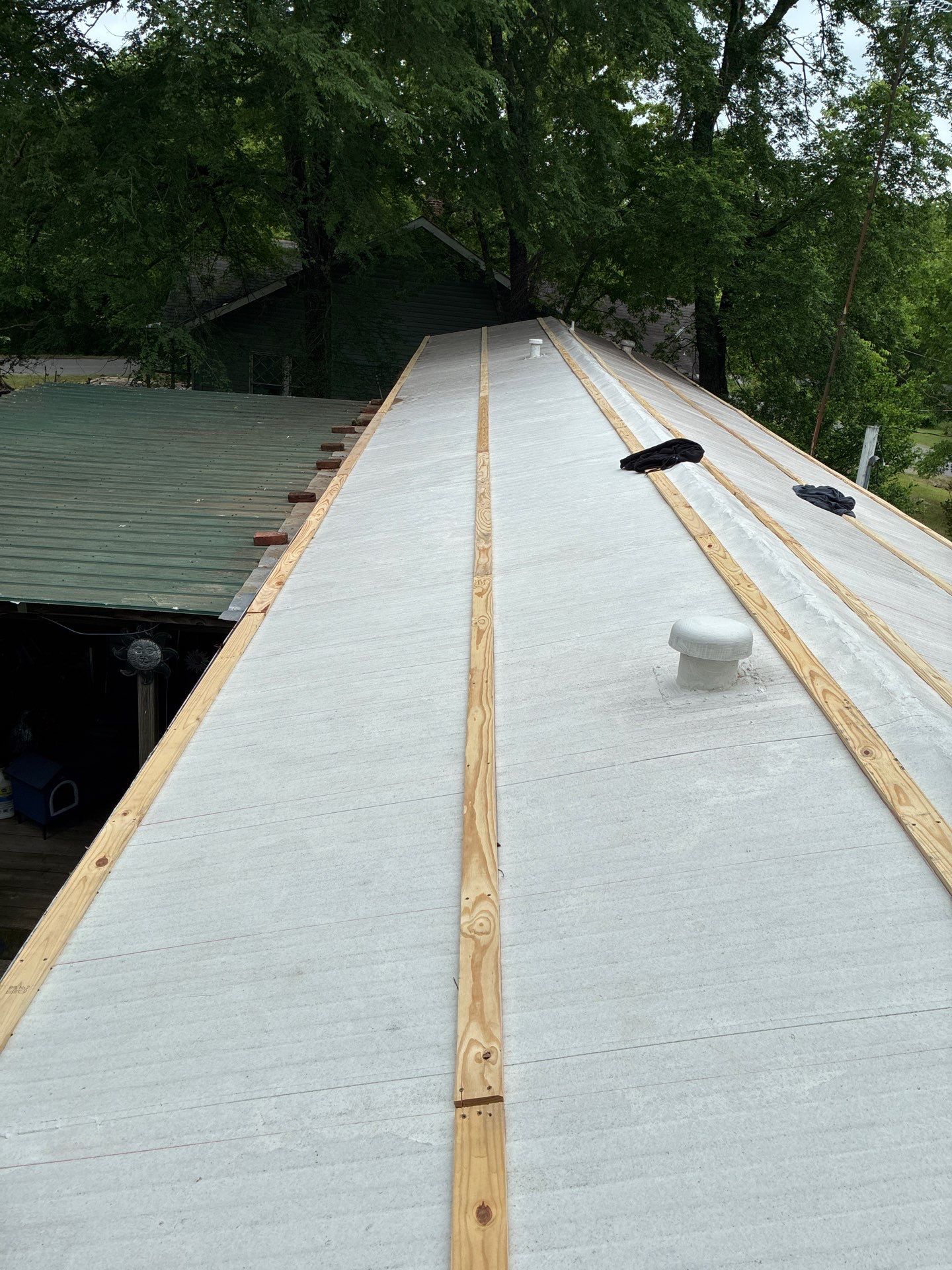 Metal roof installation by In & Out Construction & Remodeling, LLC
