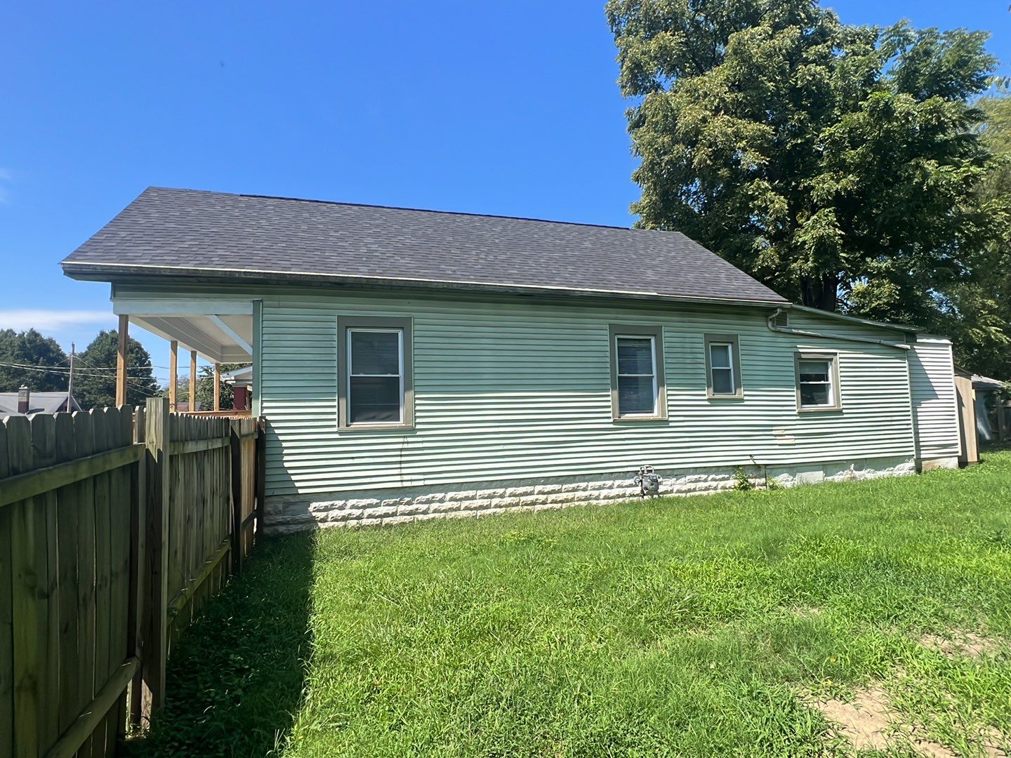 Rental Property Restoration, siding, flooring, gutters, landscaping by Storm Contracting 