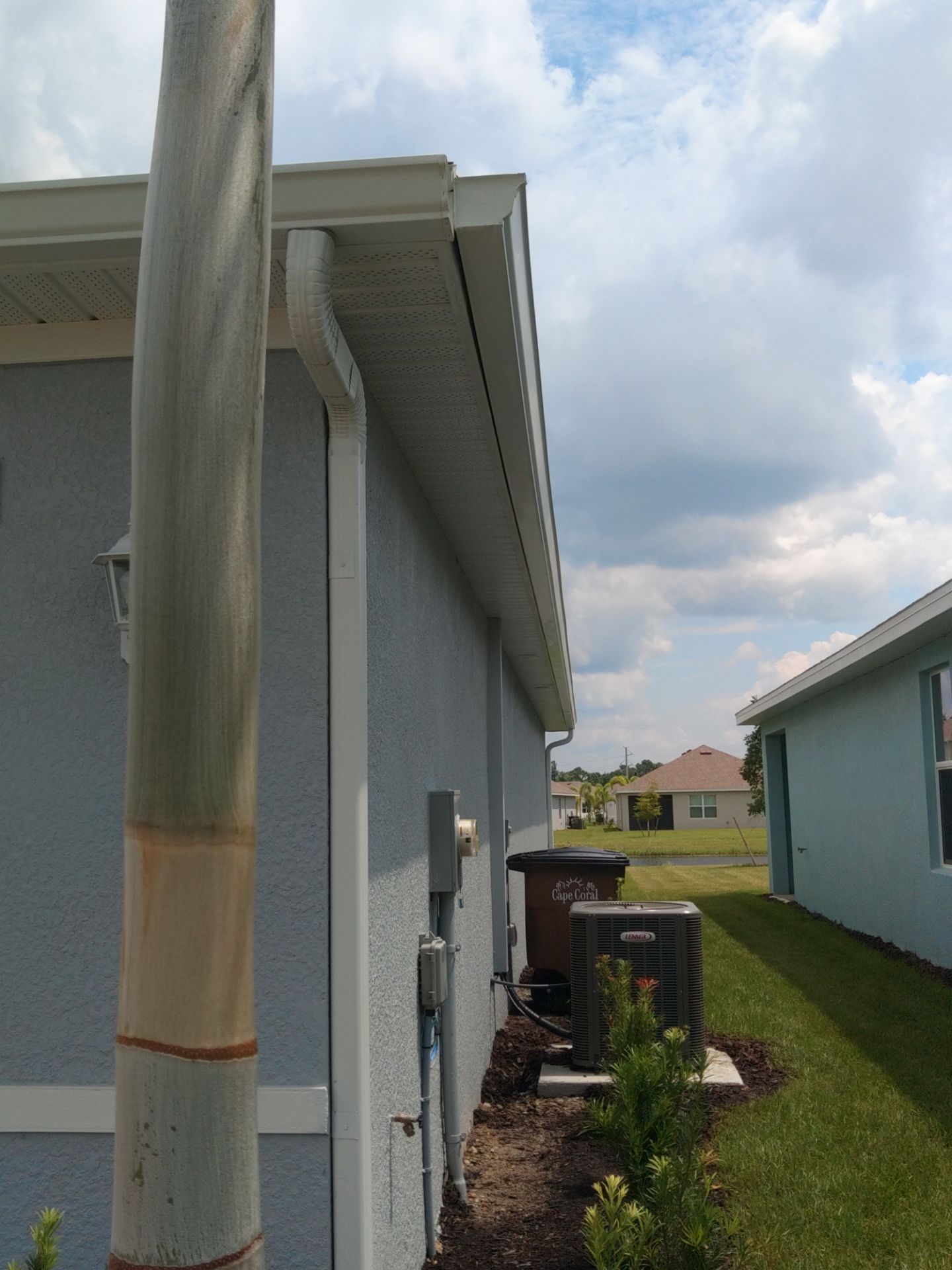 White Seamless Gutters for Beachfront Homes  by Gutter Professors