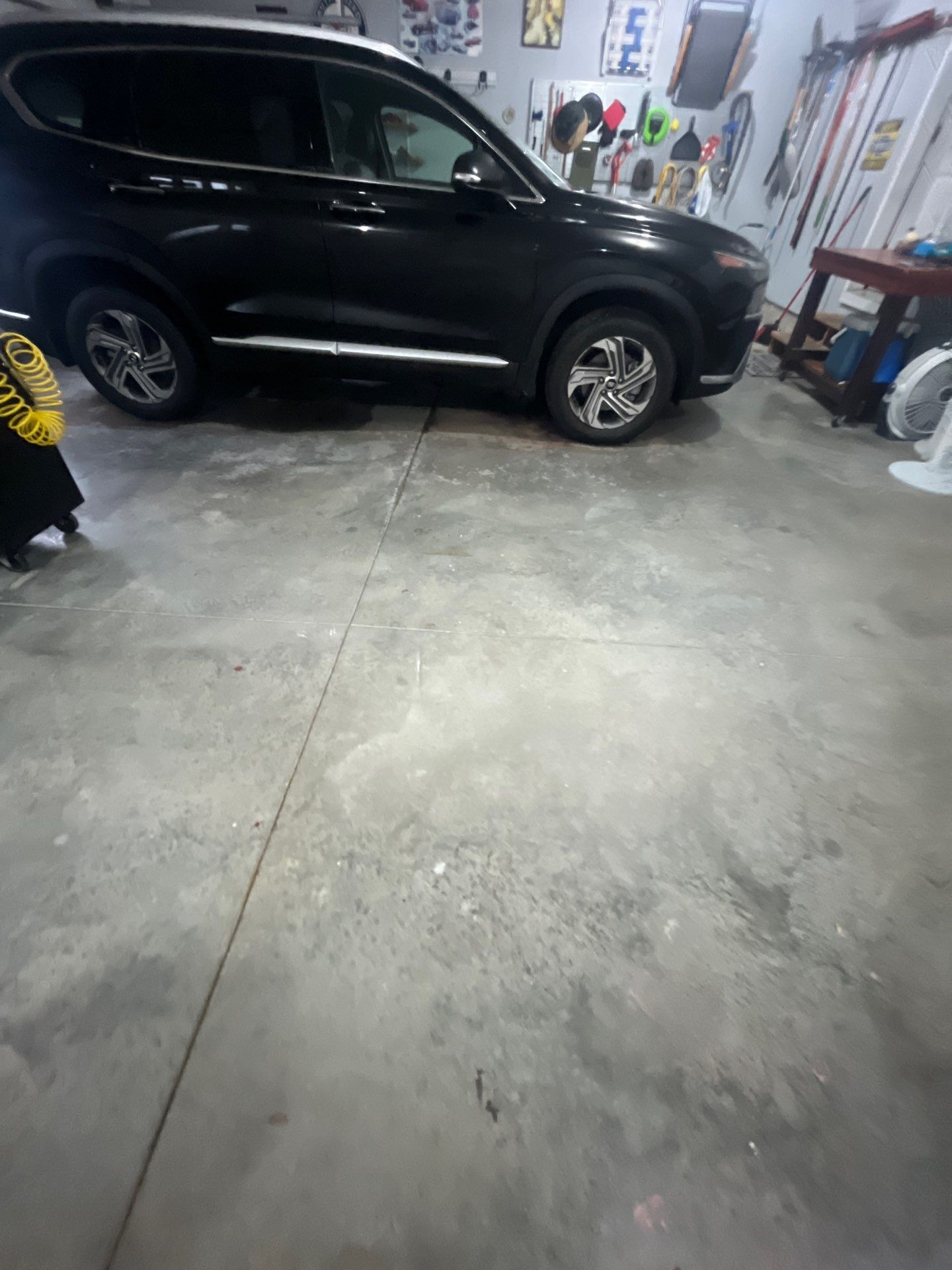 High-Gloss Epoxy Garage Floor Coating in Sioux Falls by Select Painting, Coatings & Garage Cabinets