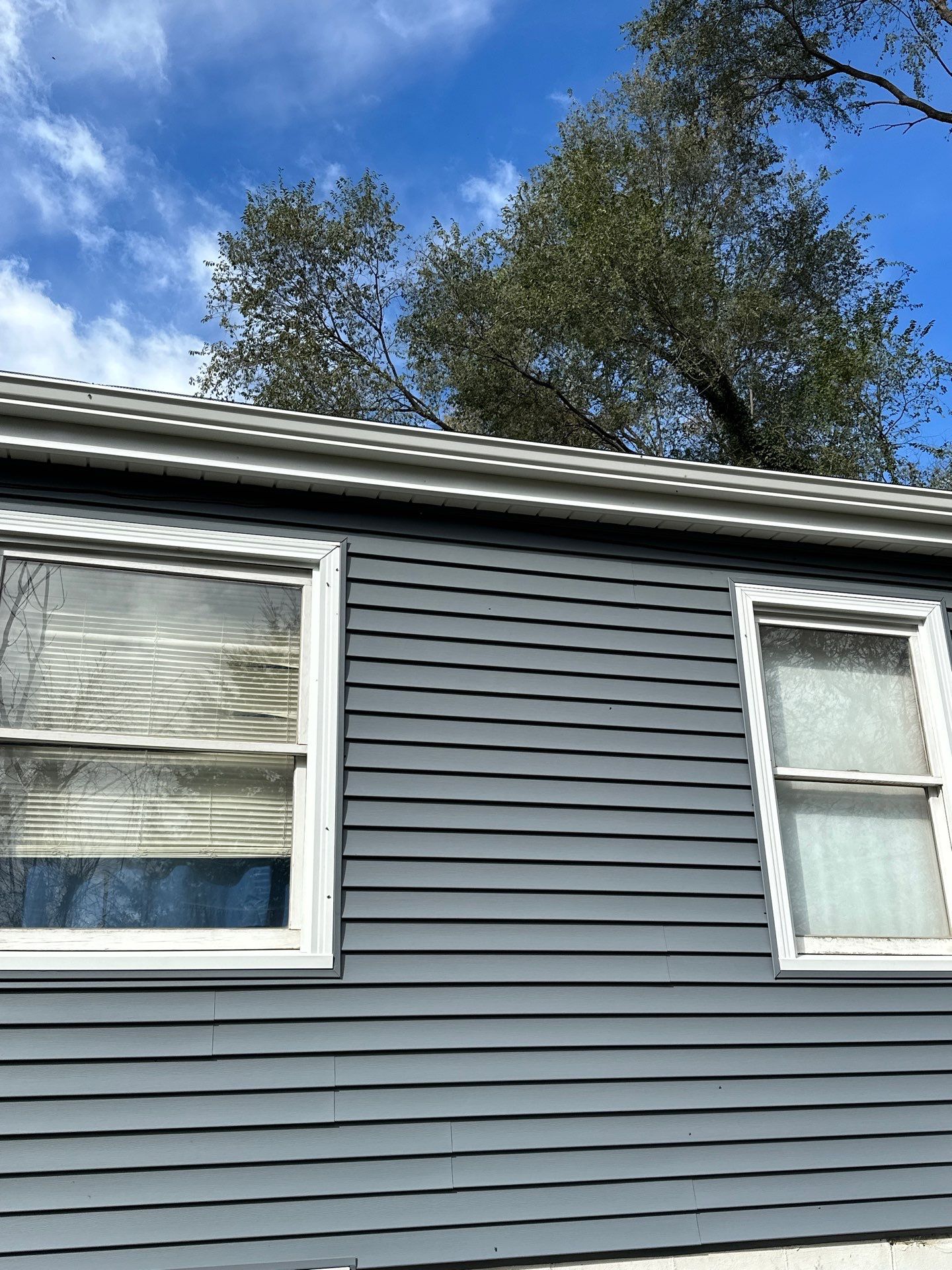 Feeling Blue in Weston Mo - Time for a Makeover by EEC Windows, Siding & Roofing