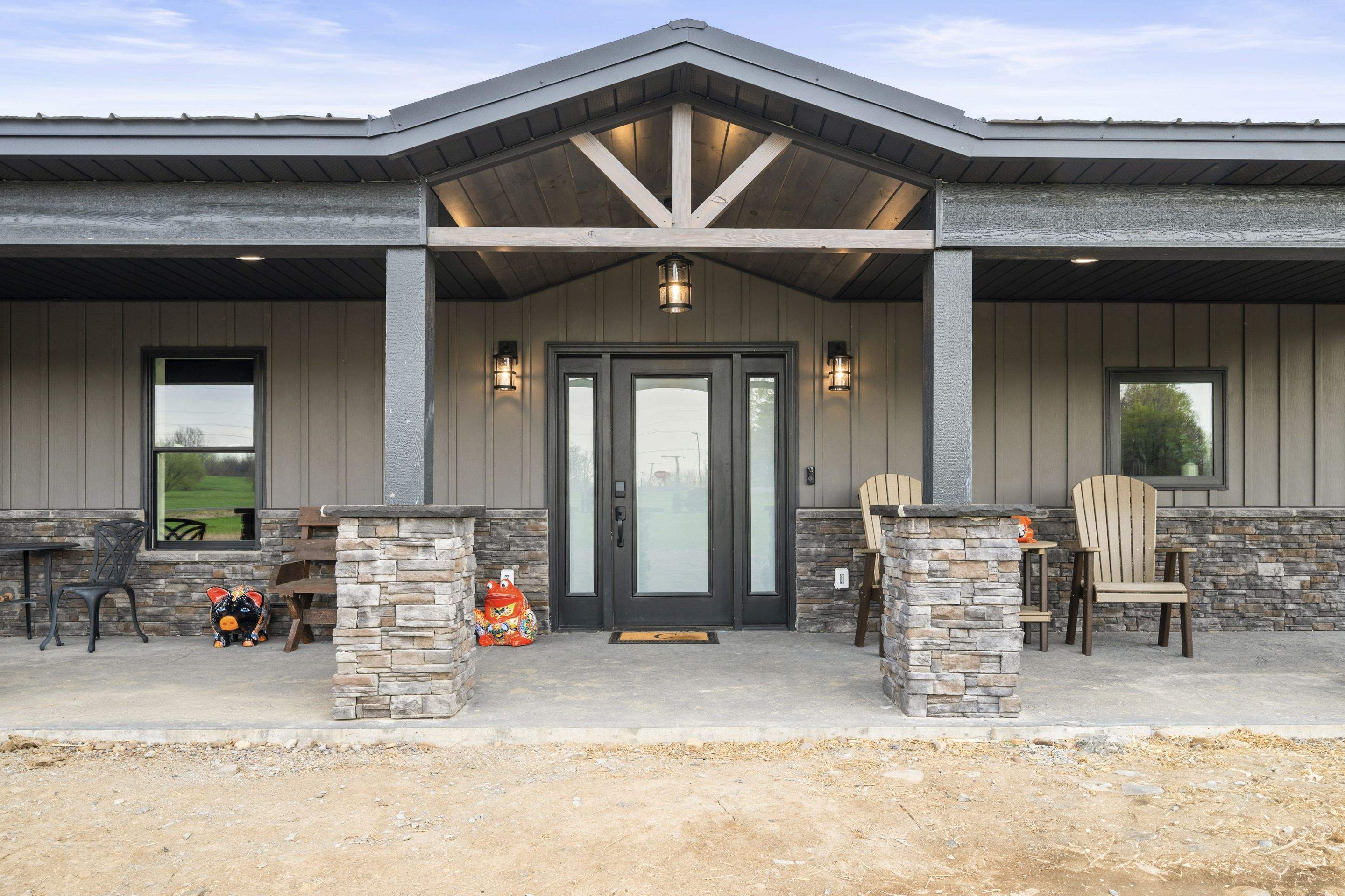 Barndominium  using Textured Board & Batton by Horst Custom Homes 