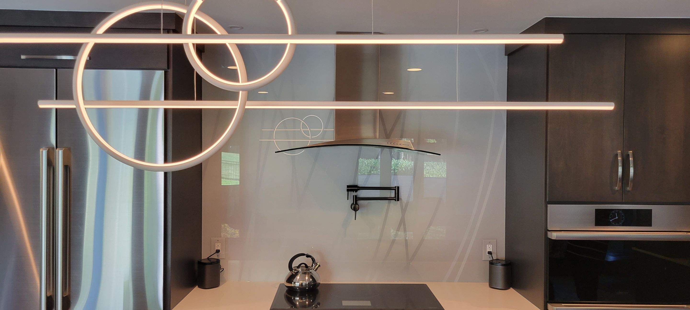 Kitchen Remodel using IMAGIO Misty Curves Solid Glass Backsplash by IMAGIO