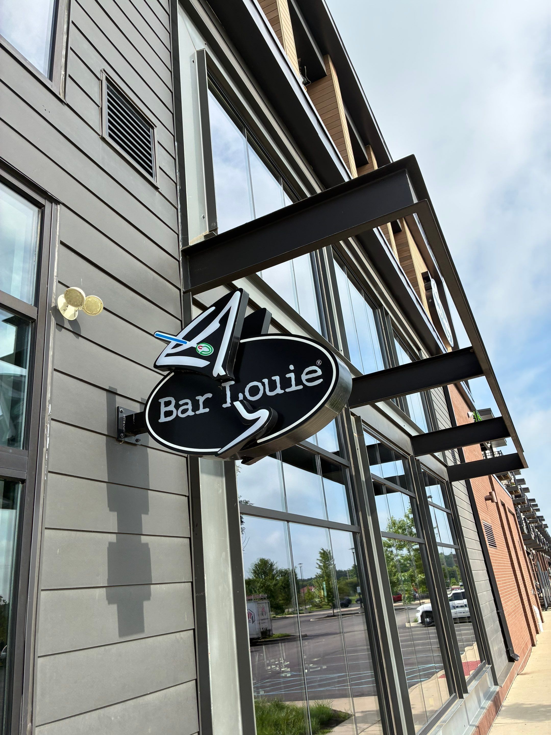 Exterior Building Signage and Vinyl Graphic Installation in Granger by Hayes Design co