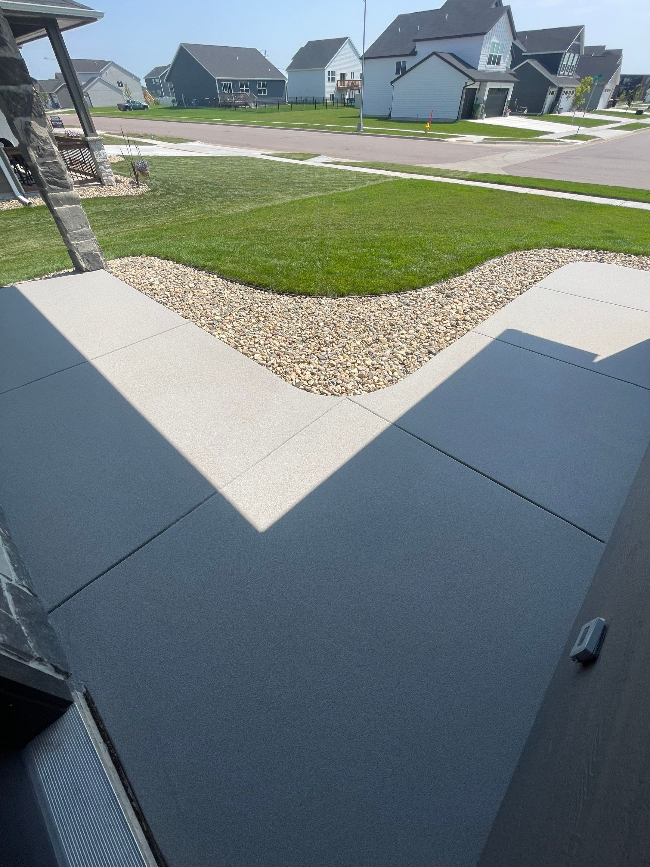 Sioux Falls Residential Concrete Patio and Walkway Coating by Select Painting, Coatings & Garage Cabinets