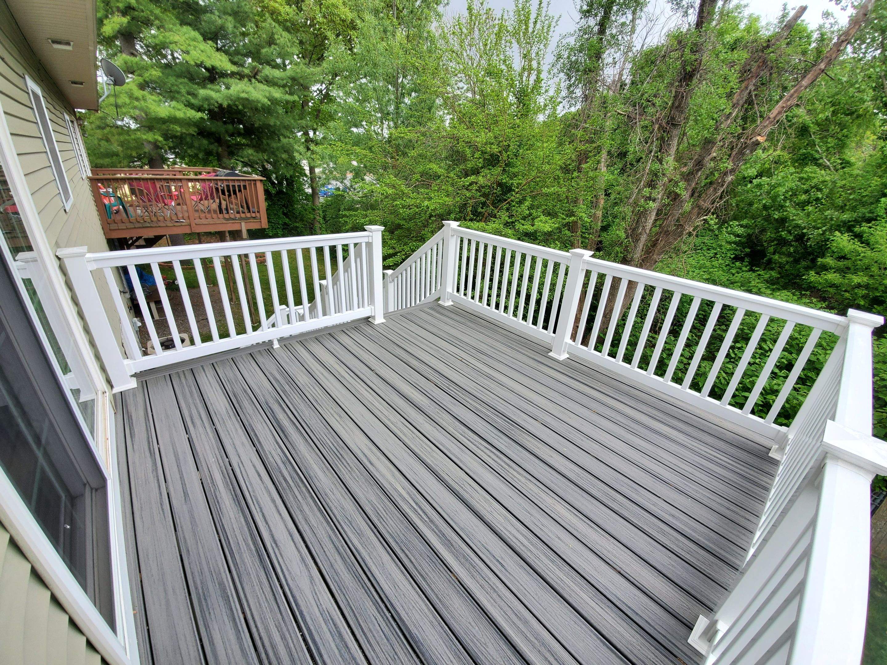 Porch/Deck Construction using Trex Decking by UBrothers Construction