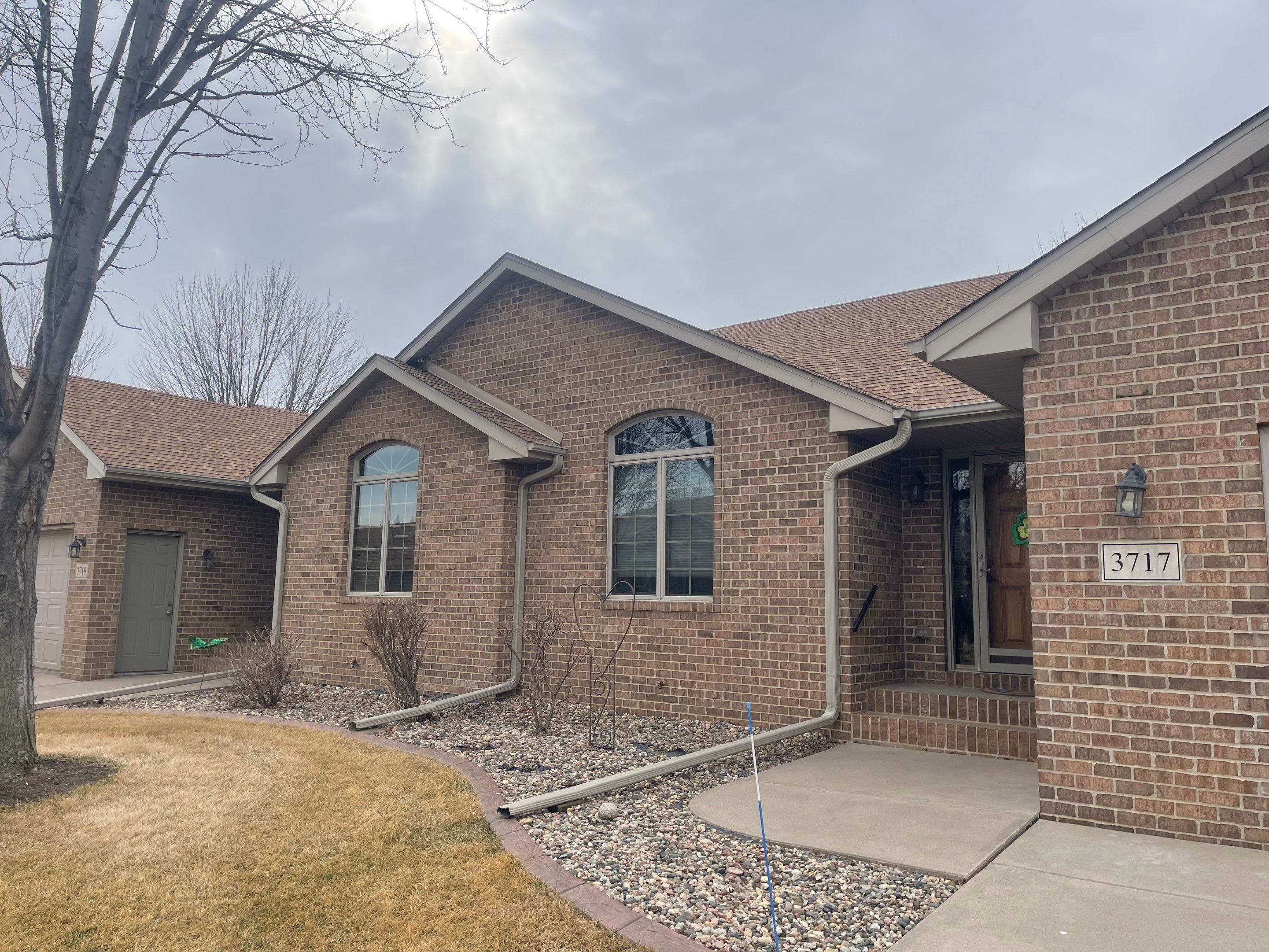 Residential Exterior Siding and Trim Painting in Sioux Falls by Select Painting, Coatings & Garage Cabinets