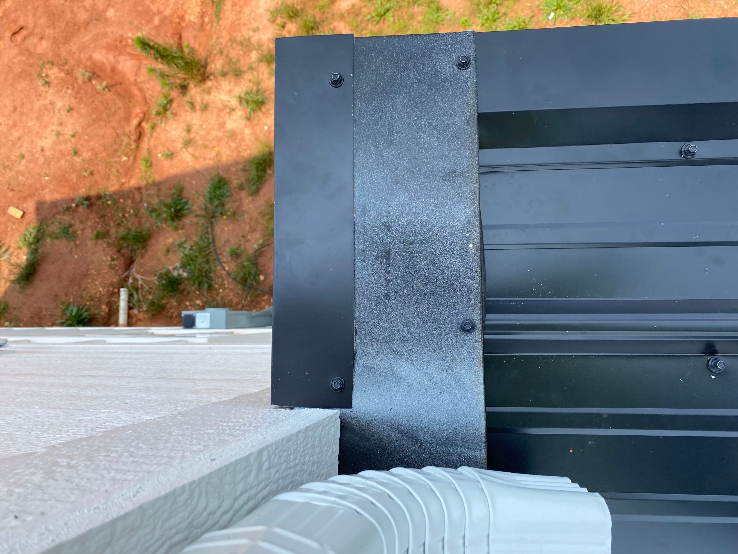 Jason's metal porch roof by BROCK BUILDERS 