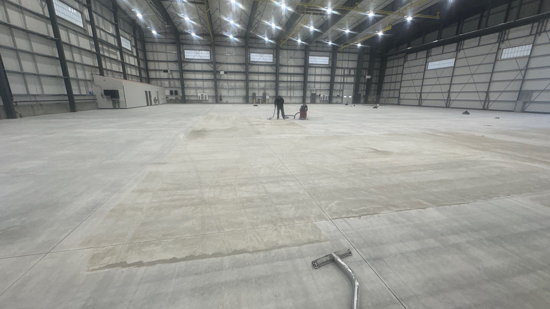 Airplane Hanger using Light Grey Commercial Penntek Epoxy by Croc Coatings, LLC