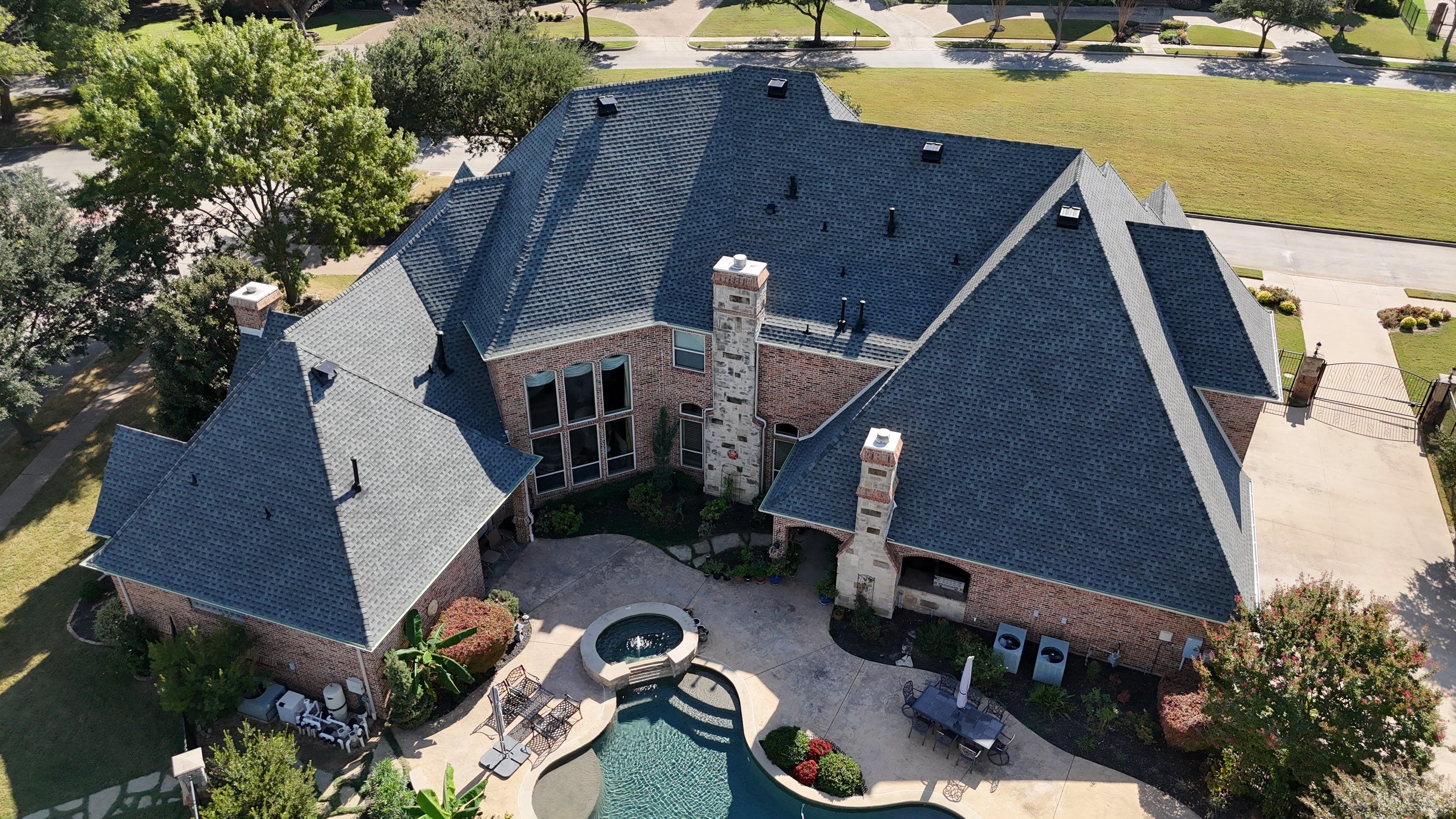 Southlake Texas Estate - Roof, Copper Awning and Gutter Project by First United Roofing & Construction