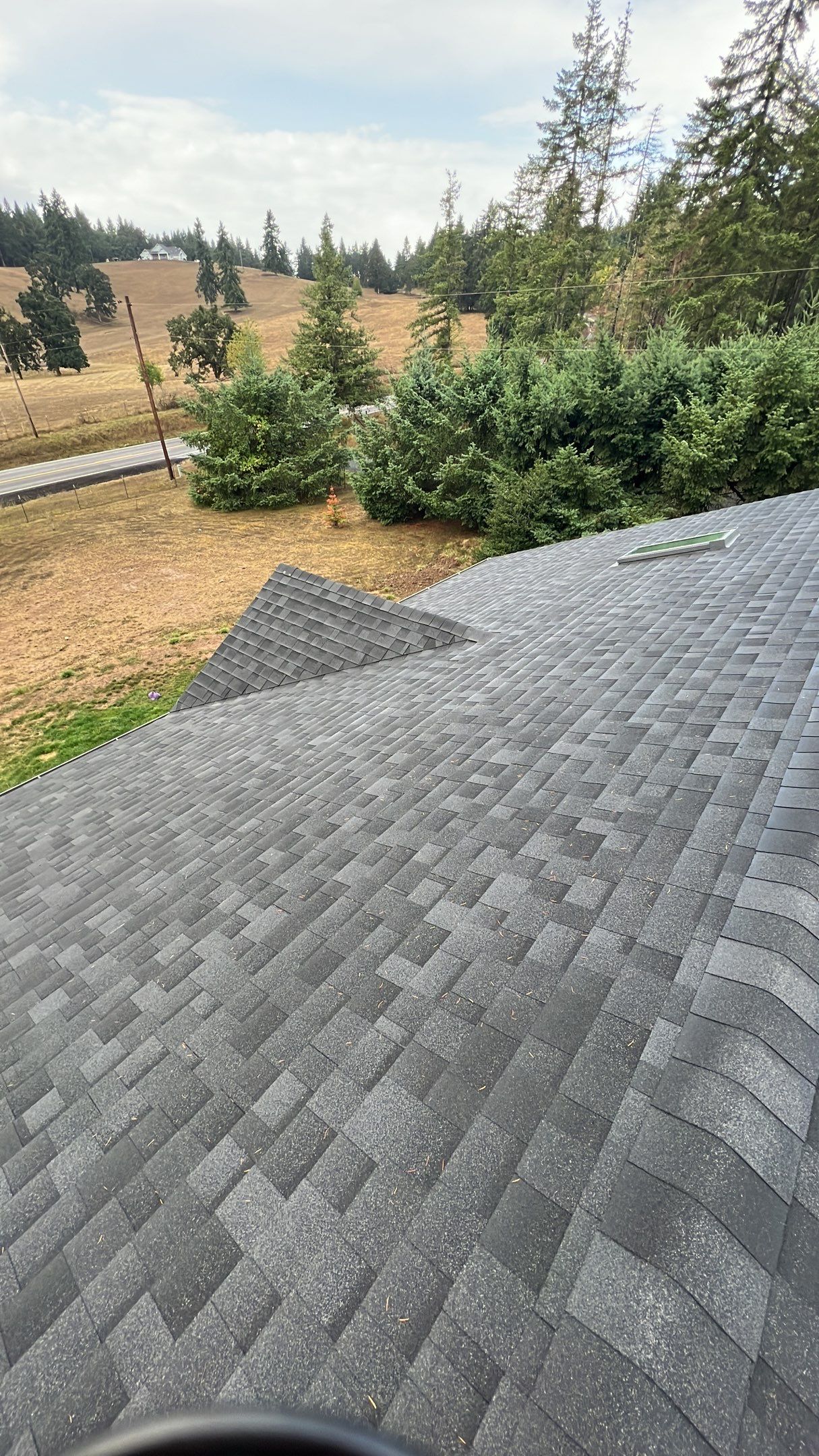 Residential Roofing Installation using IKO Dynasty (Color: Granite Black) by Orezona Building & Roofing Company, Inc.