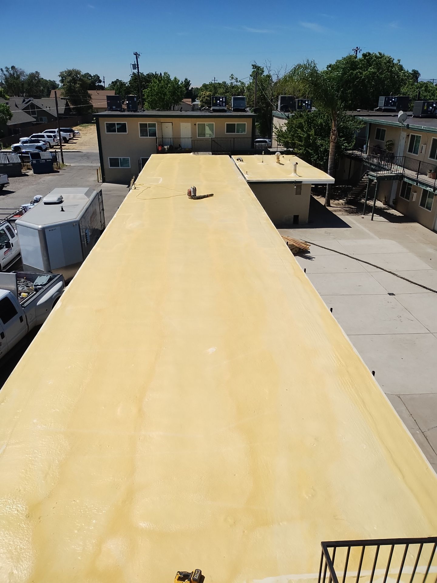 Foam Refurbish using General Coatings acrylic coatings and spray foam by Straight Edge Roofing Inc