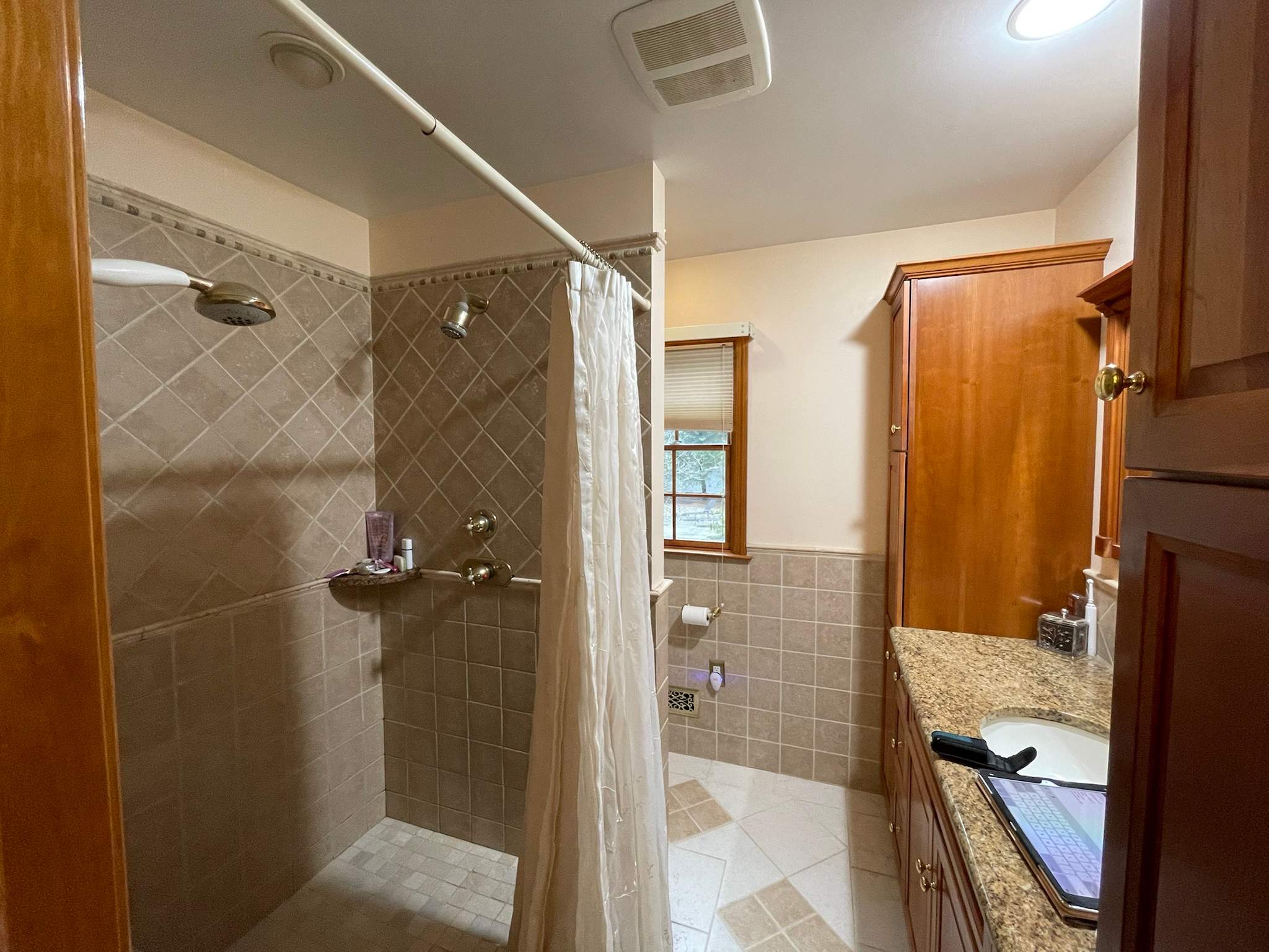 Bathroom Remodel using Tile by Home Concepts Construction