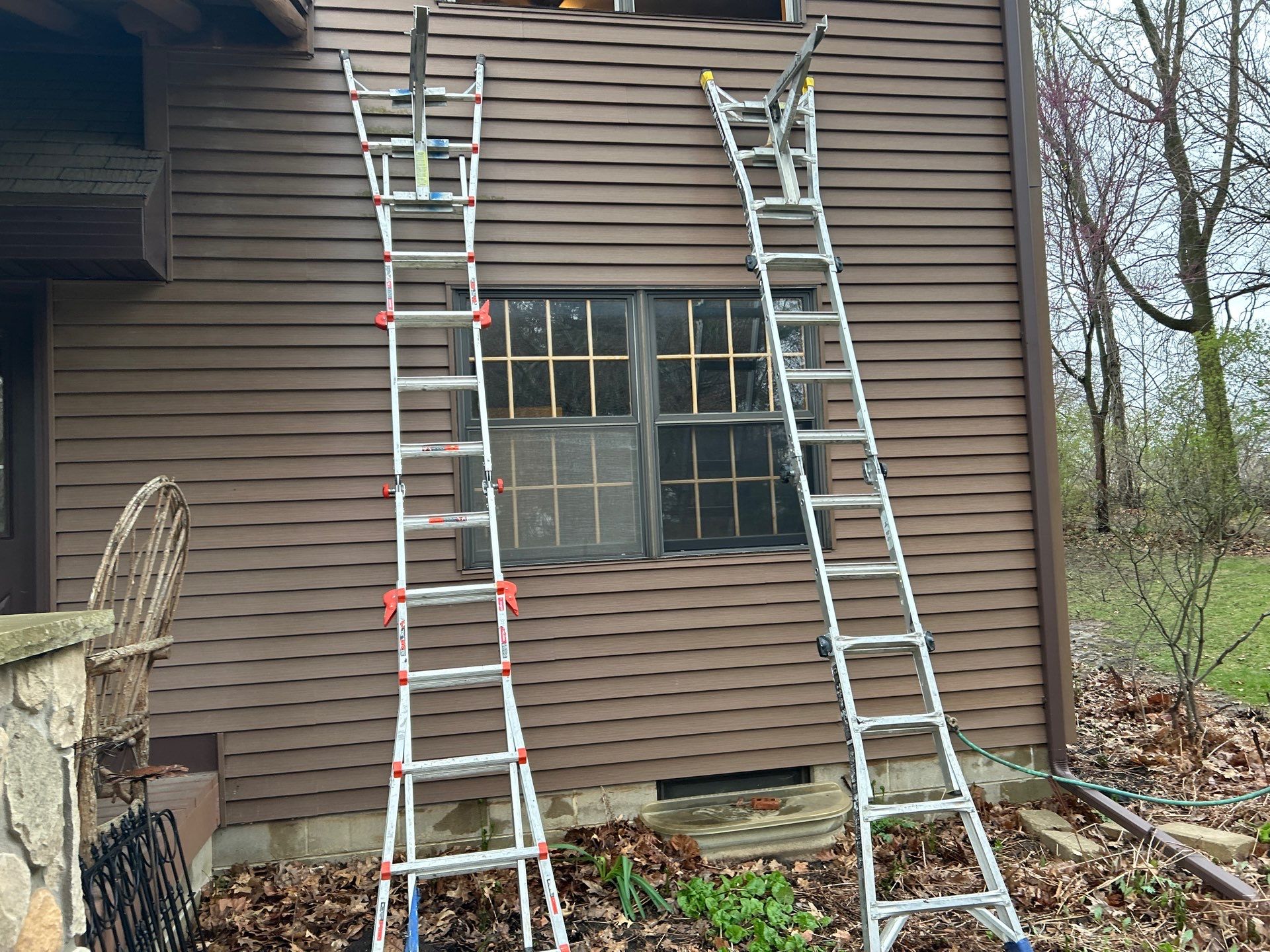 Pella Window installation using Pella Lifestyle wood/Aluminum window by United Windows and Siding LLC