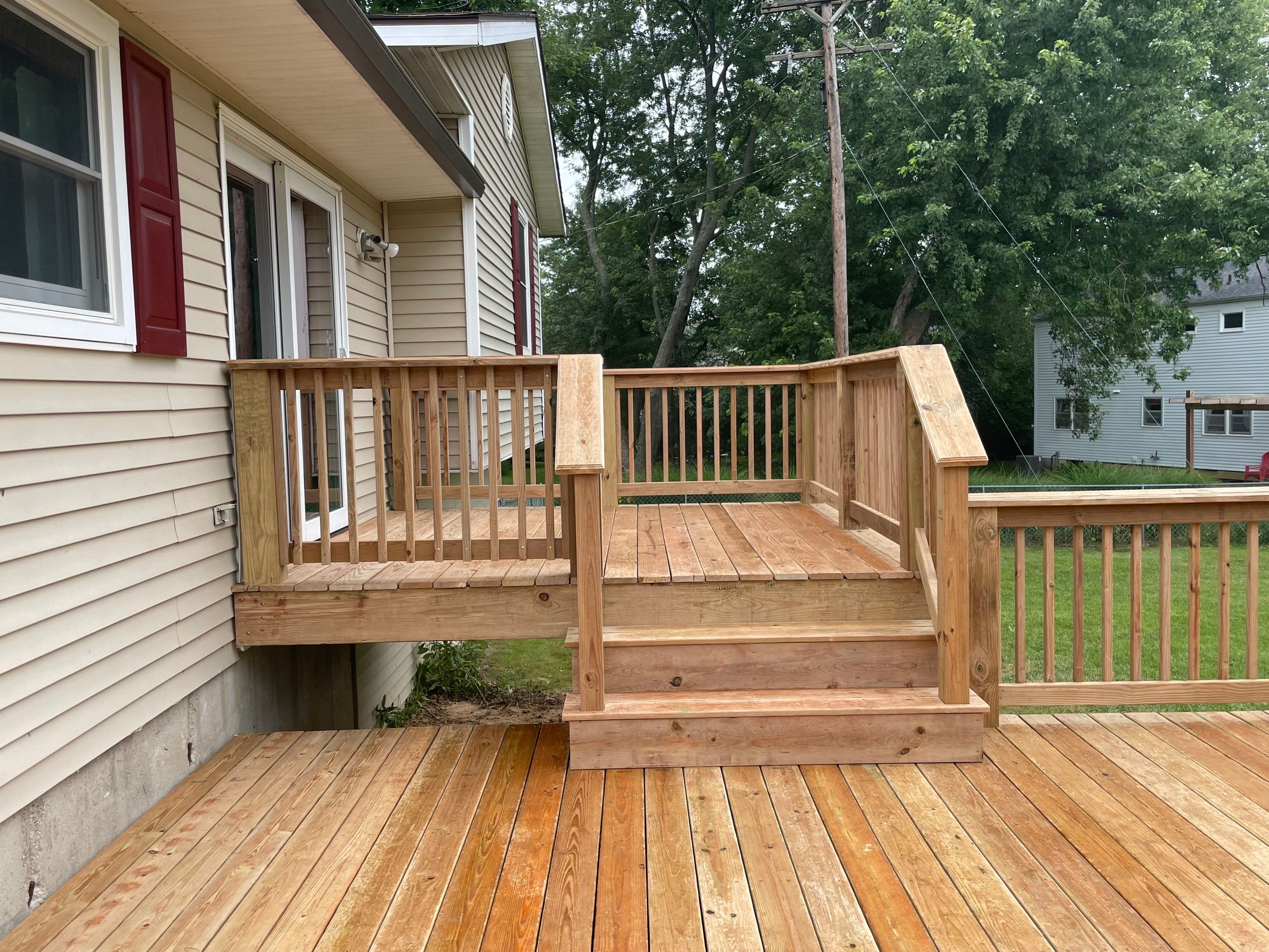 Deck Installation using Treated Lumber by Avalon Roofing and Exteriors