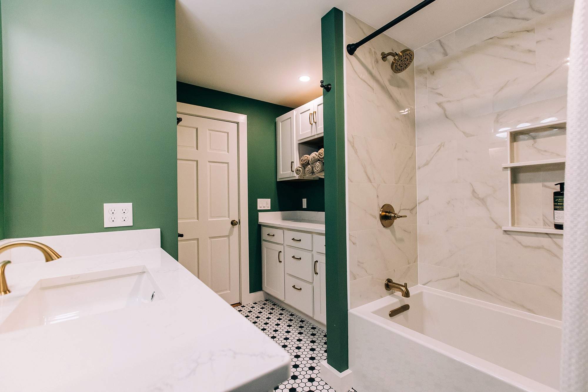 Green & Gold Bathroom by Renovatic LLC