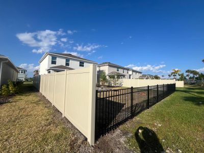 Aluminum Fence Installation using Black 3 Rail Aluminum and Vinyl Privacy Fence 