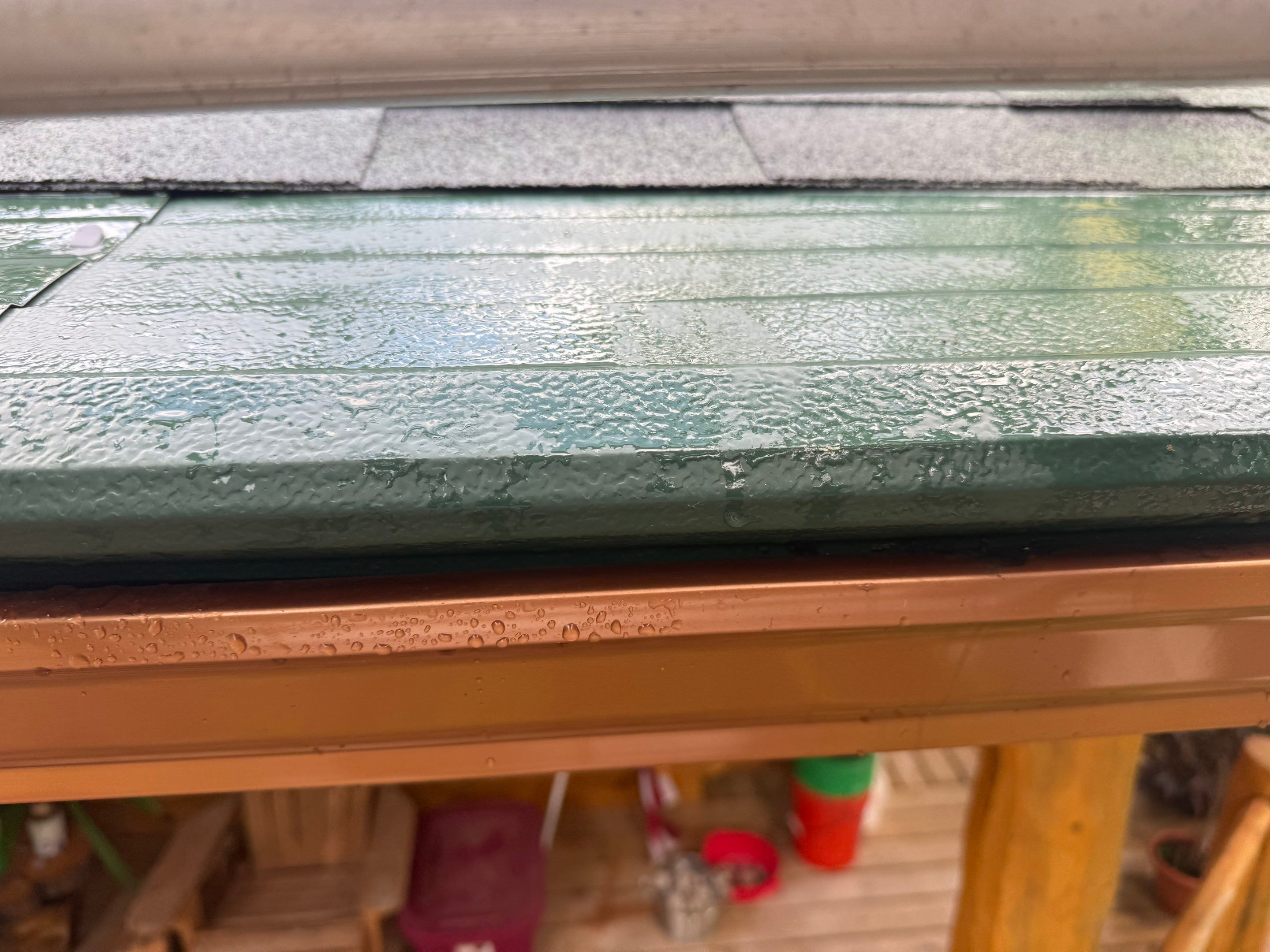 Copper Gutter and Gutter Helmet Installation on Williamsburg Log Cabin by Rainbow Seamless Systems