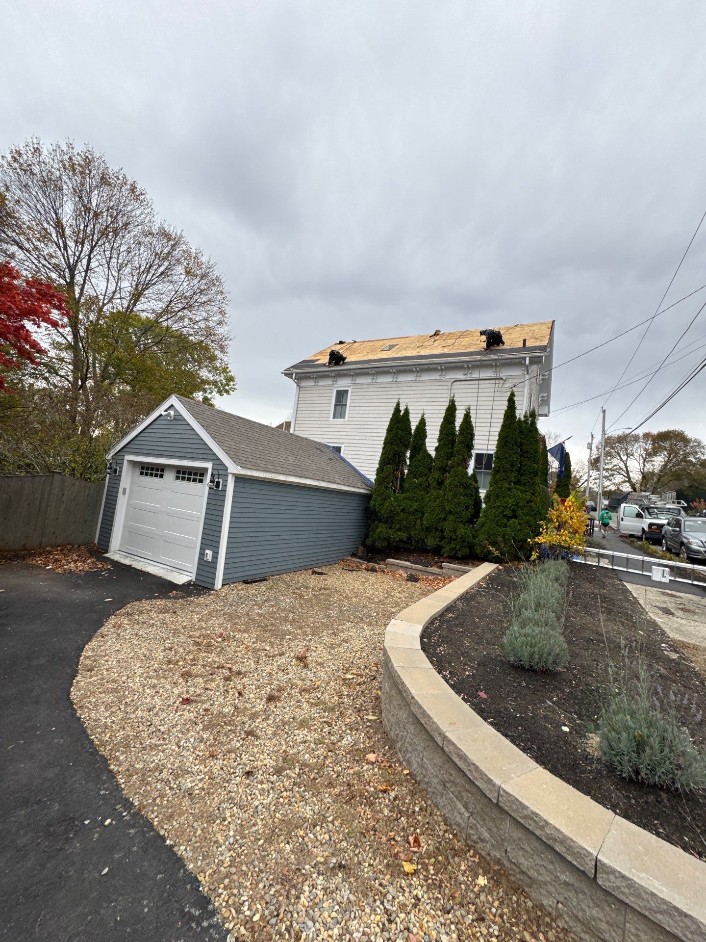 Newburyport Complete Roof Replacement with Solar Venting Skylight by Mighty Dog Roofing of Greater Middlesex County