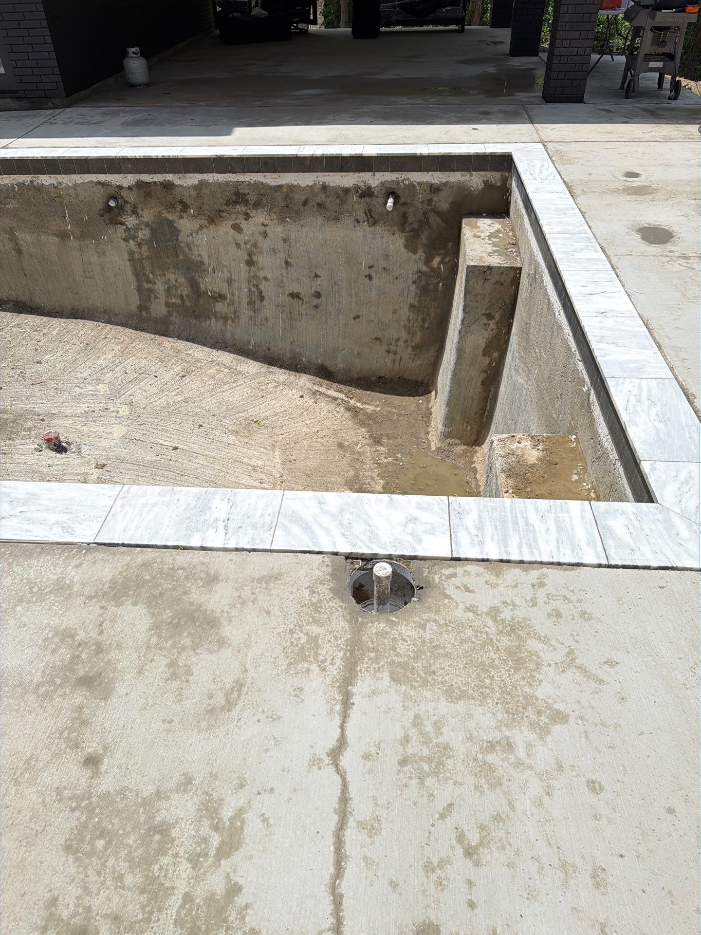 Modern Geometric Pool with Tanning Ledge by Pinnacle Pools and Spas - DFW