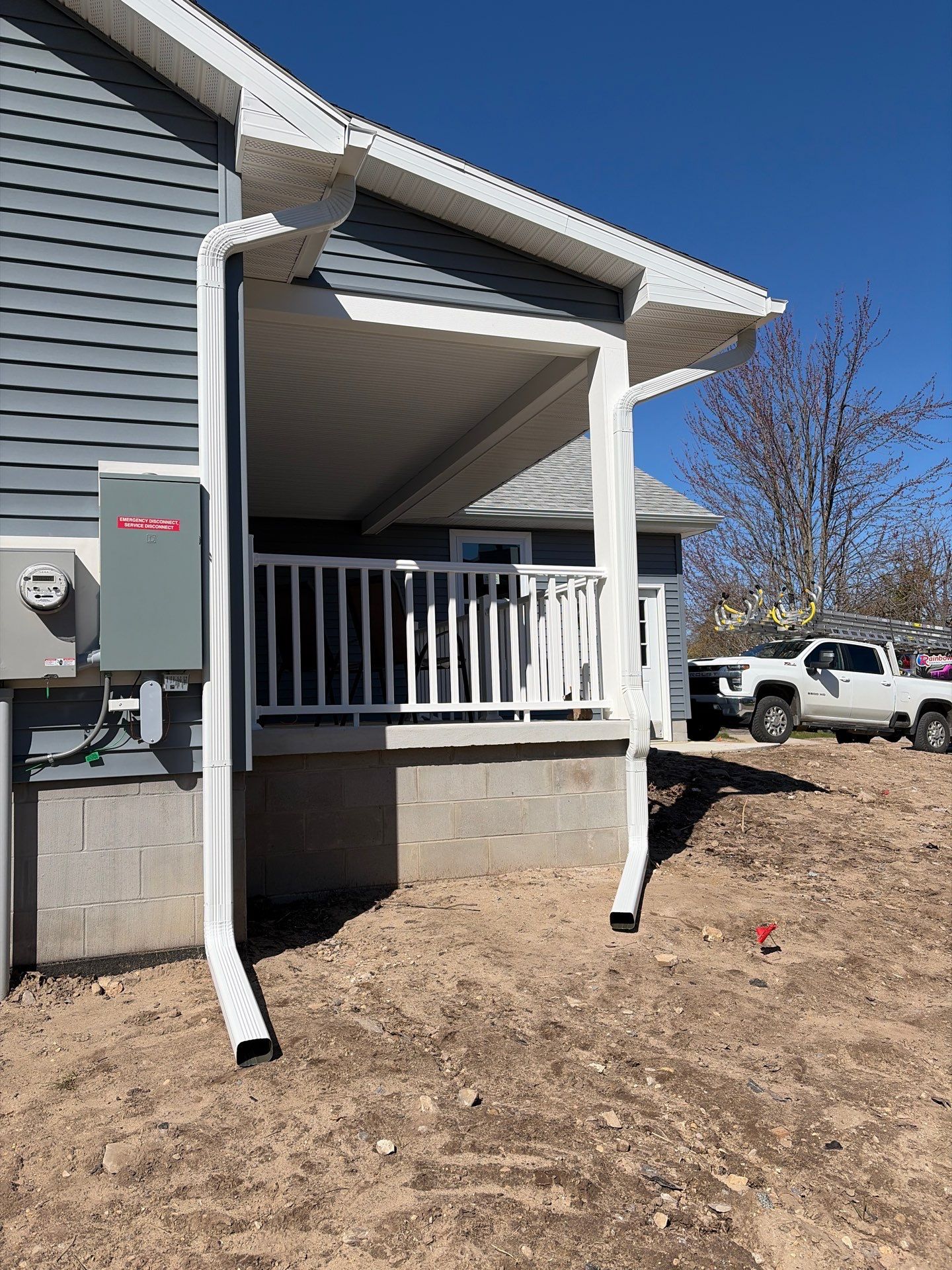Gutter System Installation for New Home Construction in Petoskey by Rainbow Seamless Systems