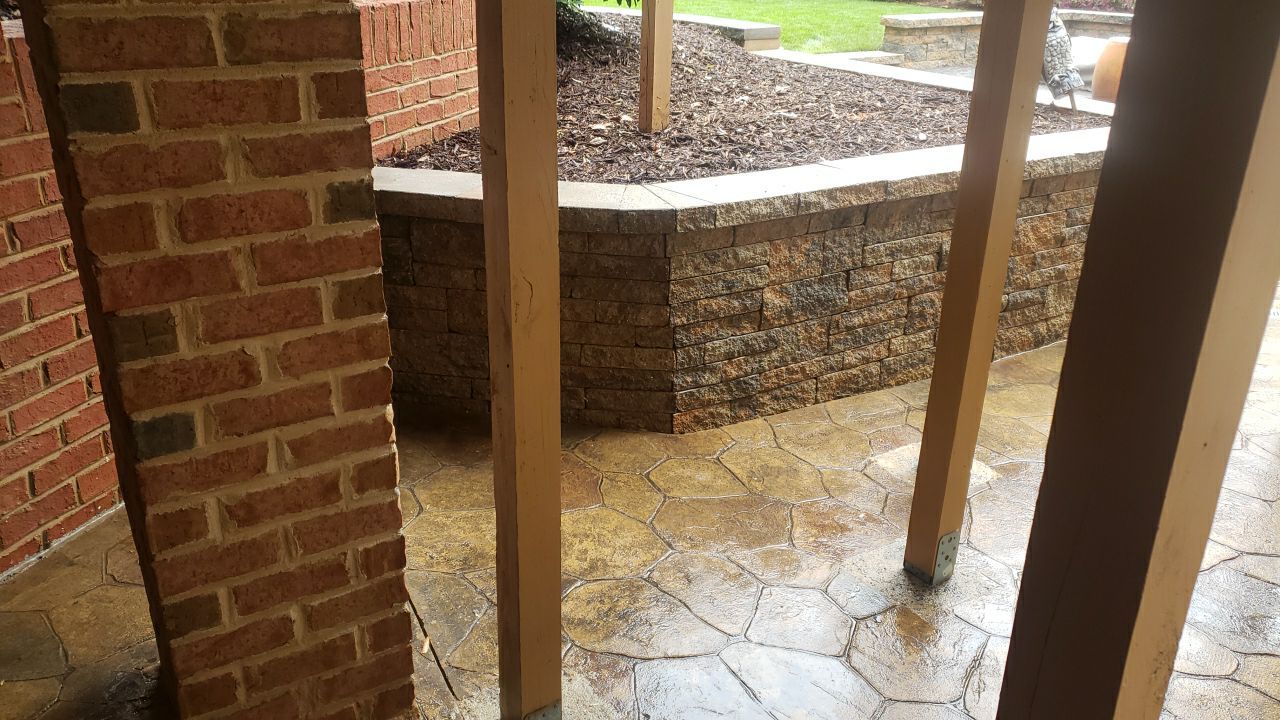 patio cleaning using cleaner by Power Wash Masters LLC