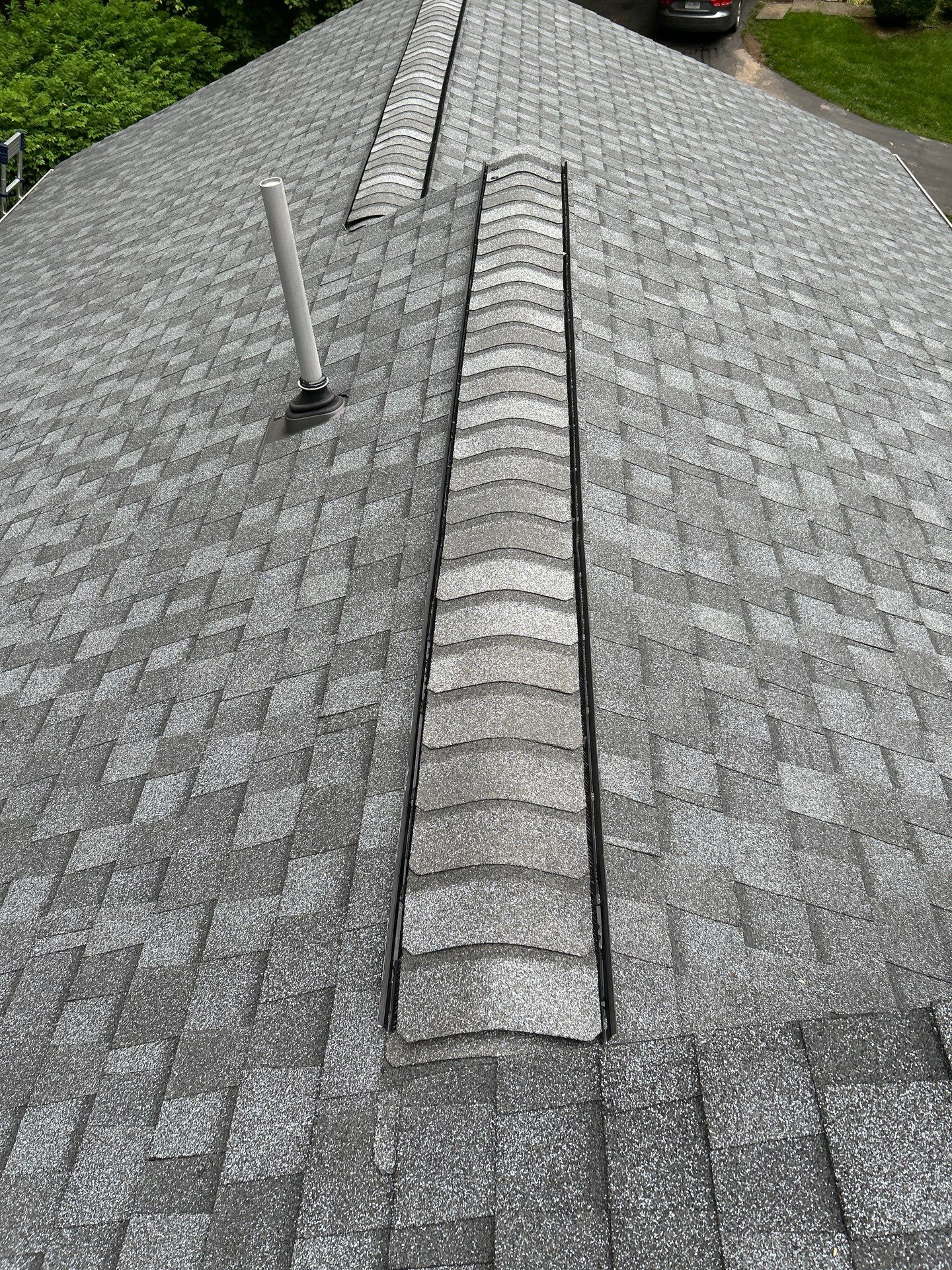 Oakton: Roof Replacement With CertainTeed Landmark Designer Shingles in Pewter by RM Banning, Inc.