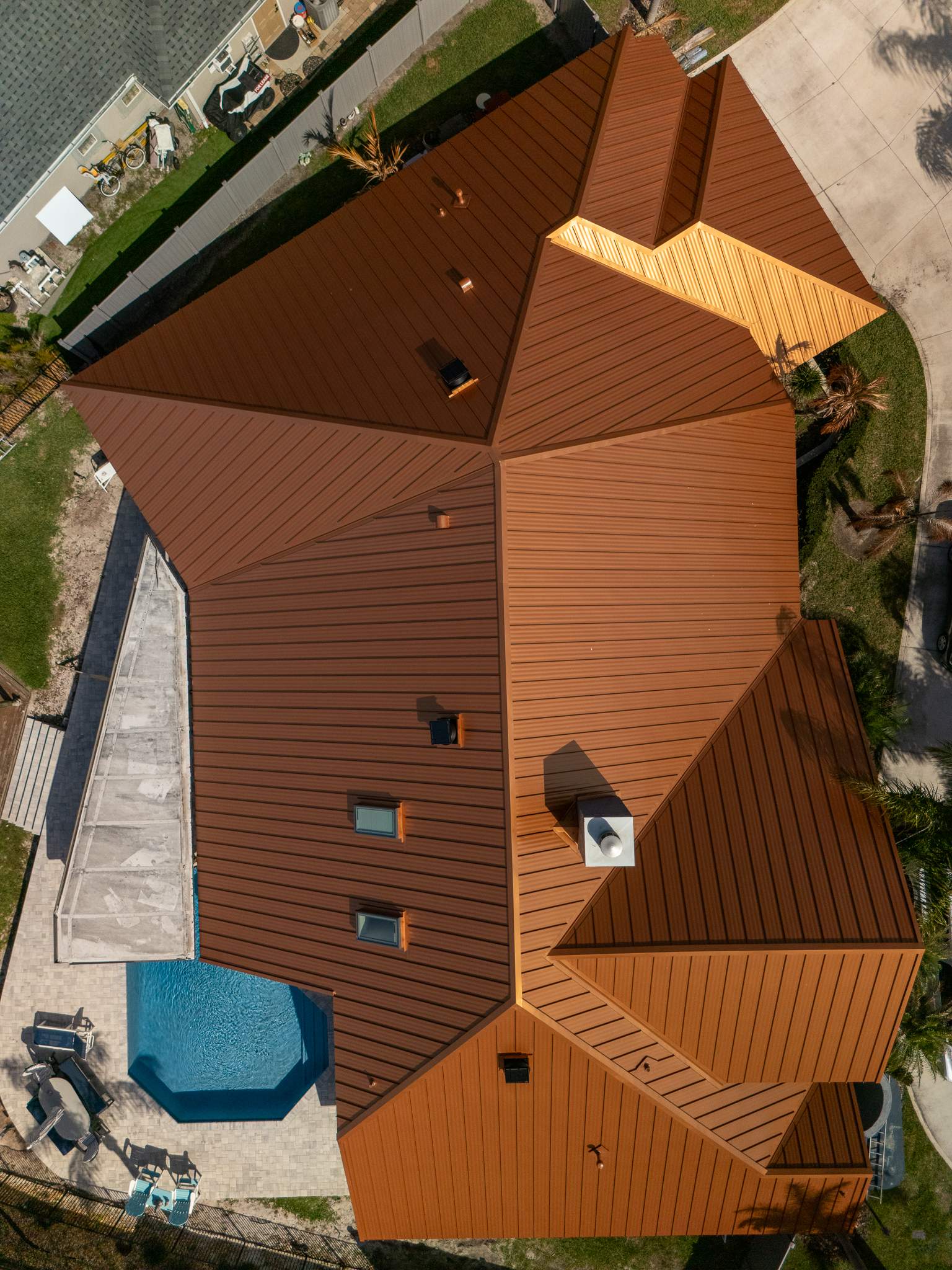 Copper Standing Seam Metal Roof Installation in Merritt Island, Florida by Wiedmann Construction & Roofing