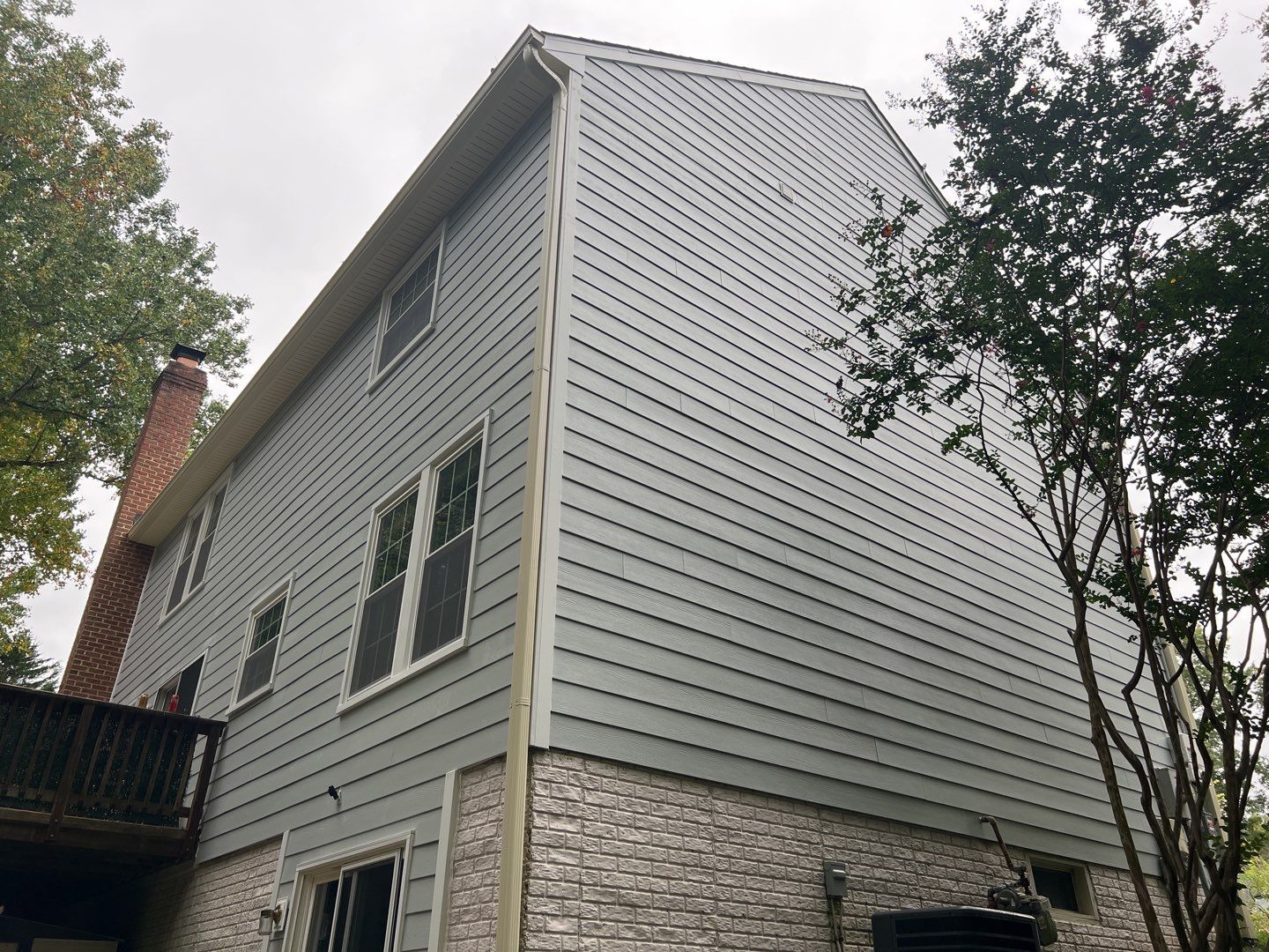 Exterior Home Makeover using GAF Timberline HDZ, GAF Decotech, and James Hardie Siding by American Home Contractors