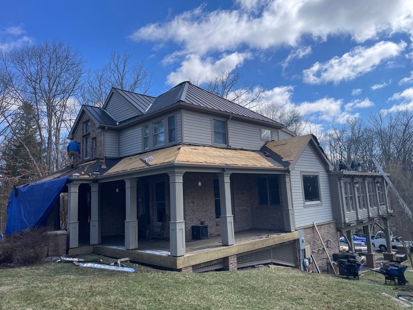 Metal Roof Replacement  by American Home Contractors