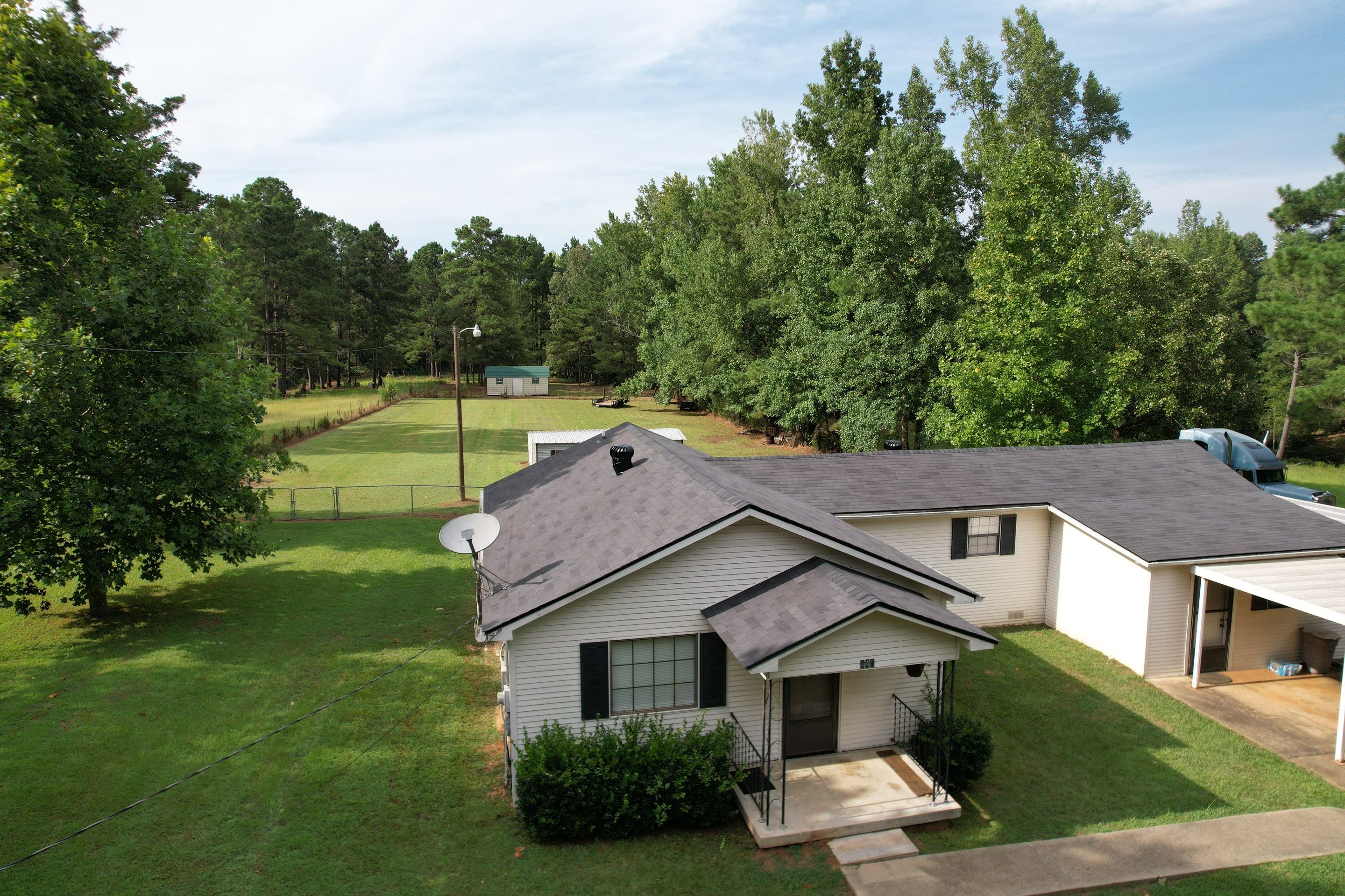 Residential Shingle Reroof using CertainTeed XT25: Moire Black by Hostetler Roofing