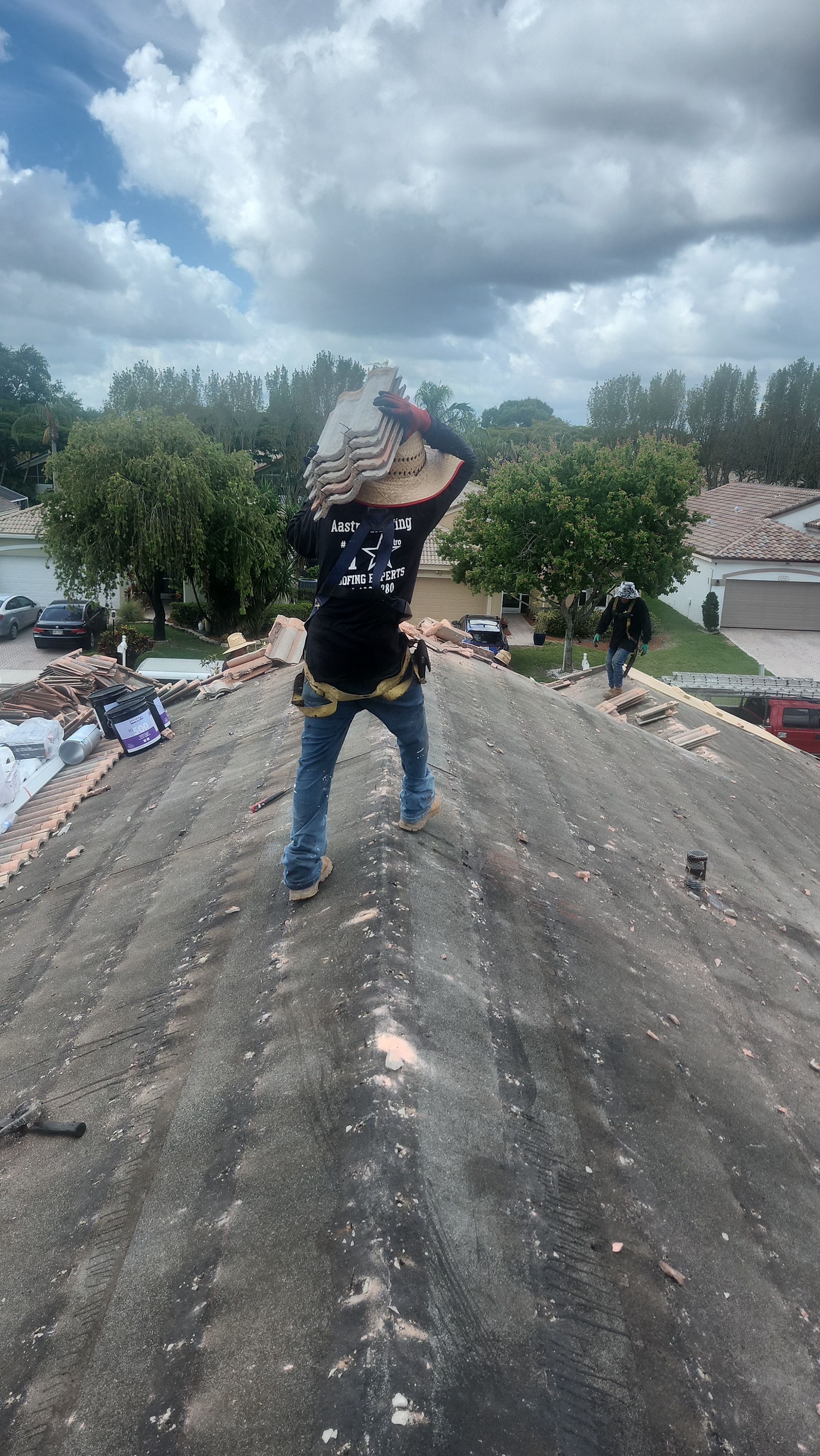 New Barrel Tile Roof Installation and Decking Repair in Boynton Beach by Aastro Roofing