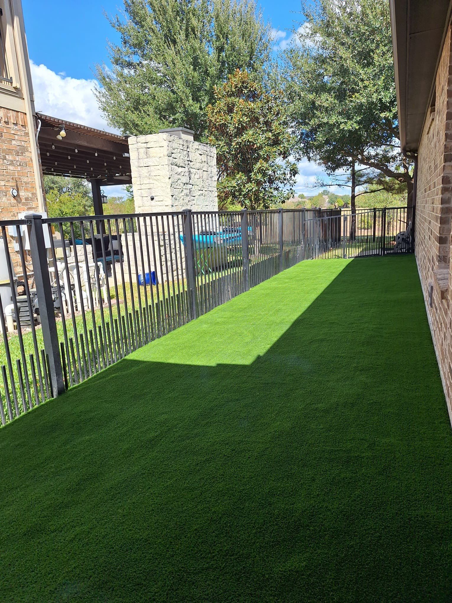 Say Goodbye to Soggy Sides: Artificial Turf & Drainage for Austin ! ๐ฟ๐ง by Texas Urban Elements