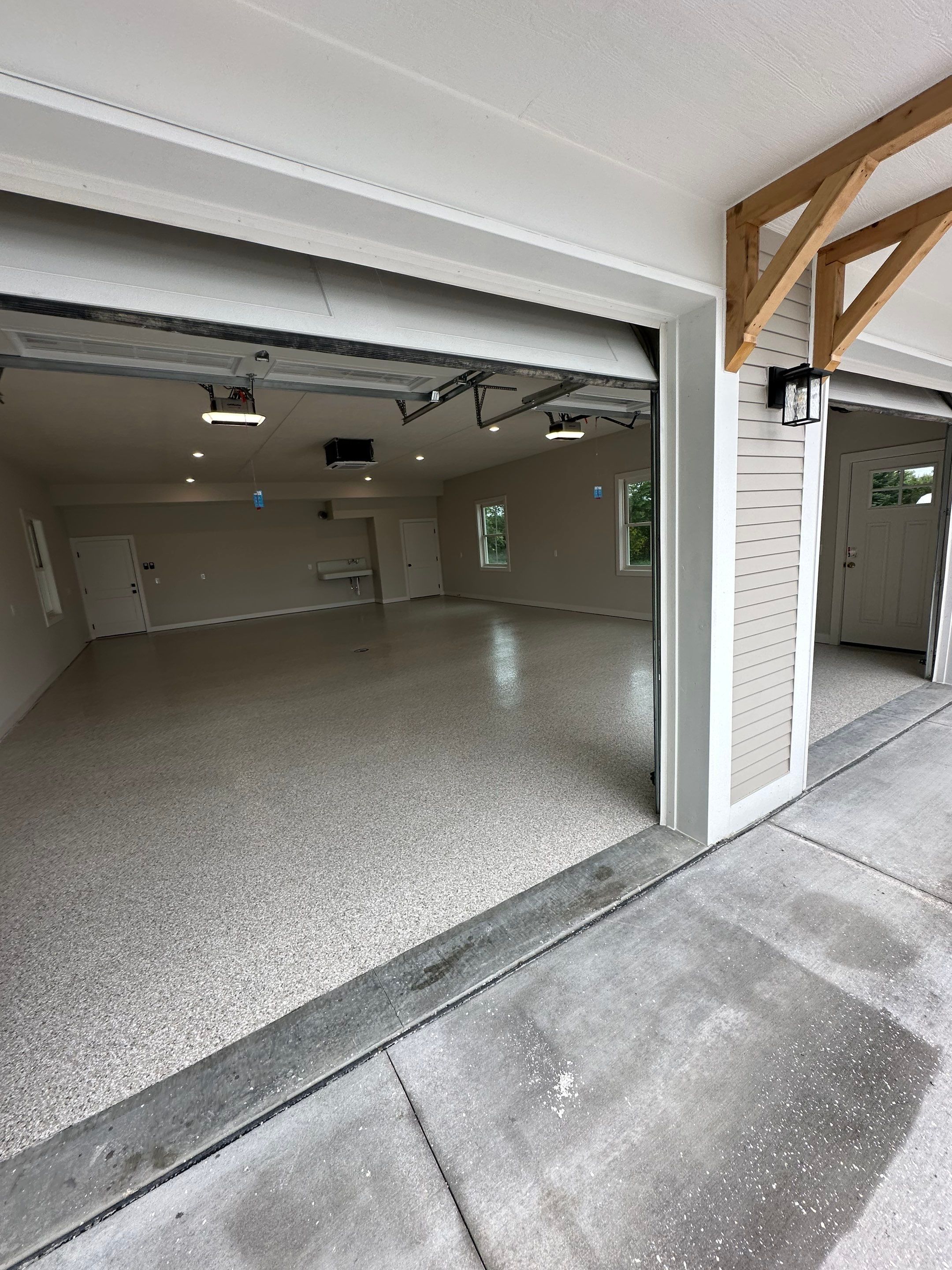 Trail Mix Epoxy Garage / Even Space by Goat Coatings