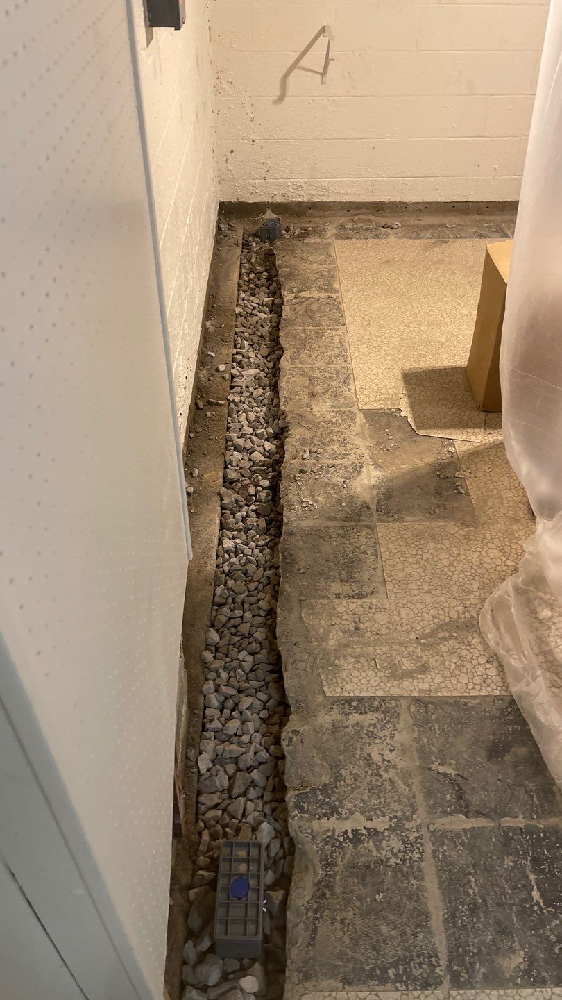 Interior Waterproofing Using GrateDrain™ Products by Toledo Basement Repair