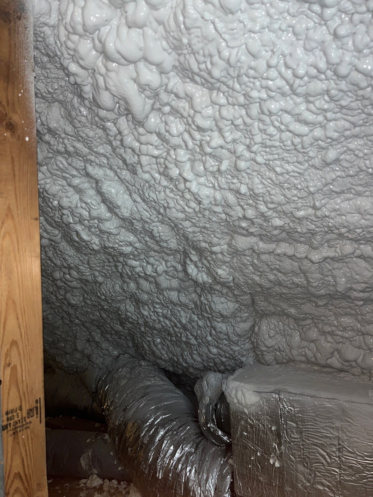 Attic Insulation using open cell spray foam by NYS Foam & Energy