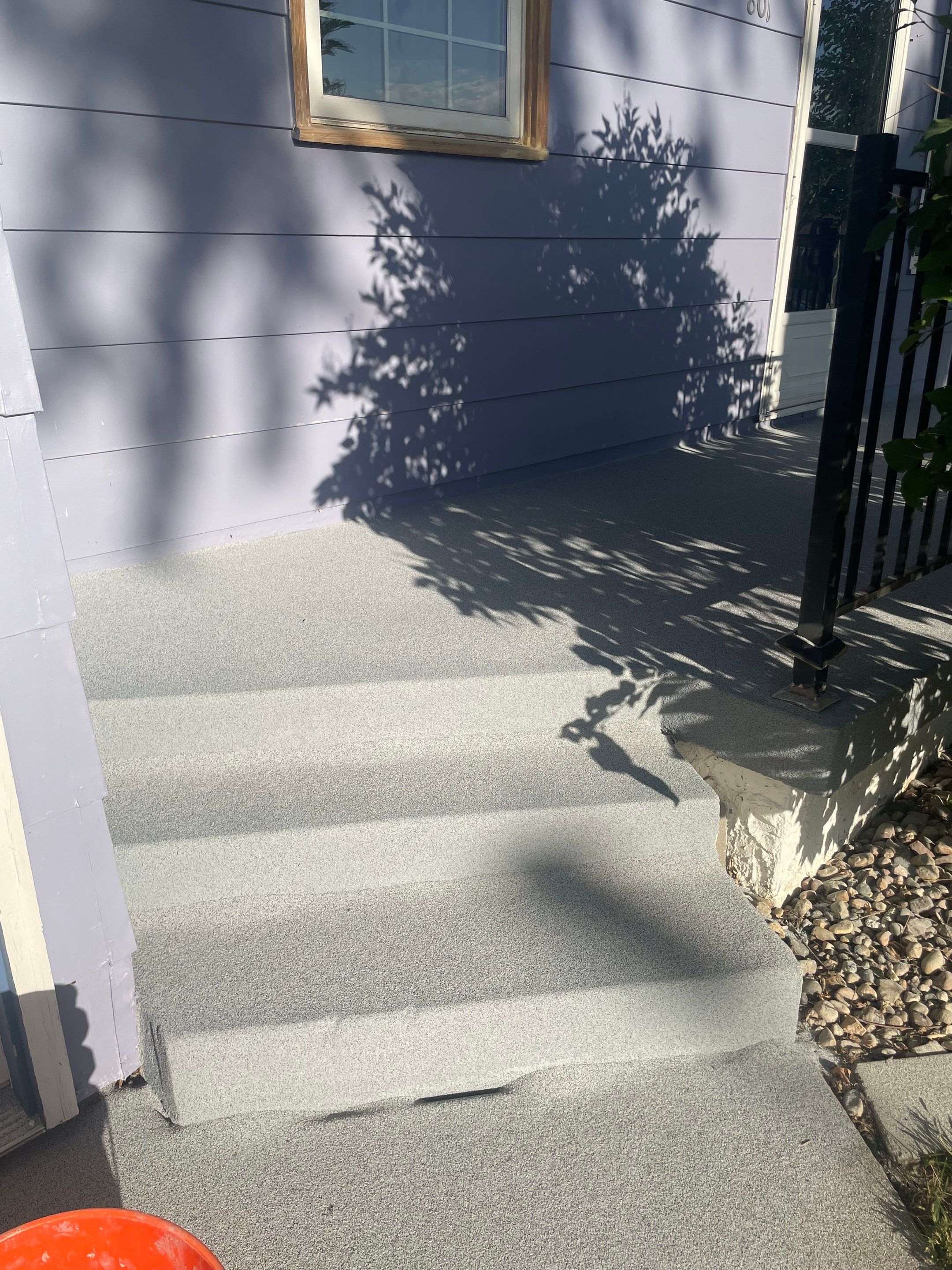 Sioux Falls Concrete Porch Coating with Starry Evening Finish by Select Painting, Coatings & Garage Cabinets