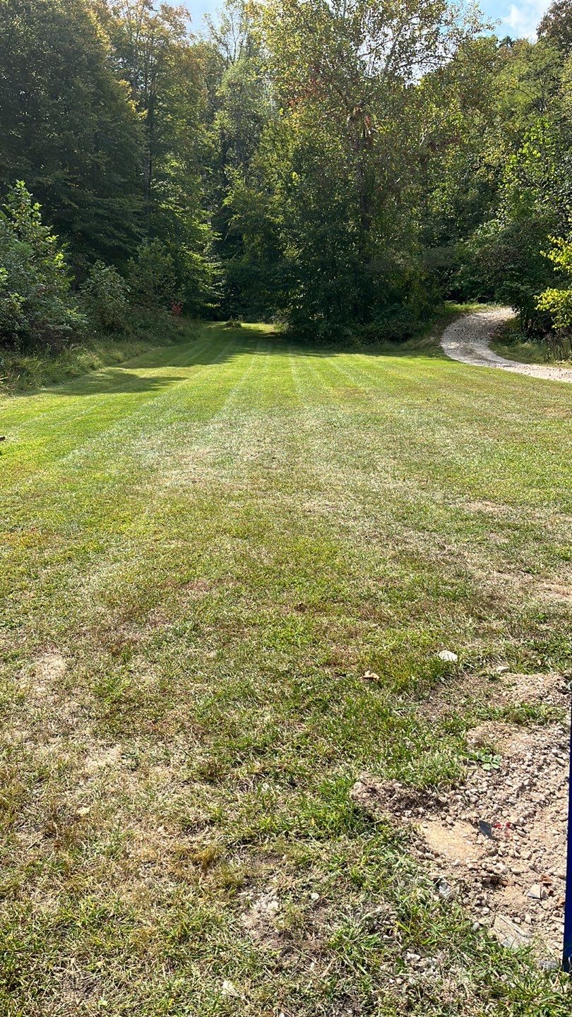 Lawn Mowing using Lawn mower by GrassBusters, Inc.