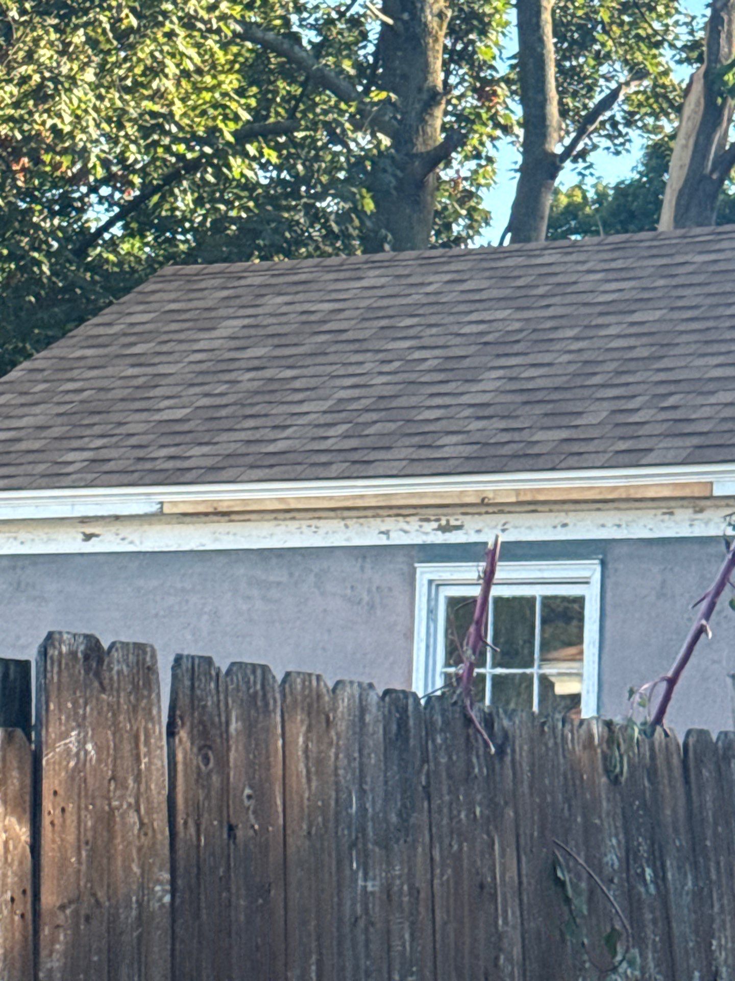 Garage Roof Replacement & Trim Repair by Mighty Dog Roofing of Greater Middlesex County