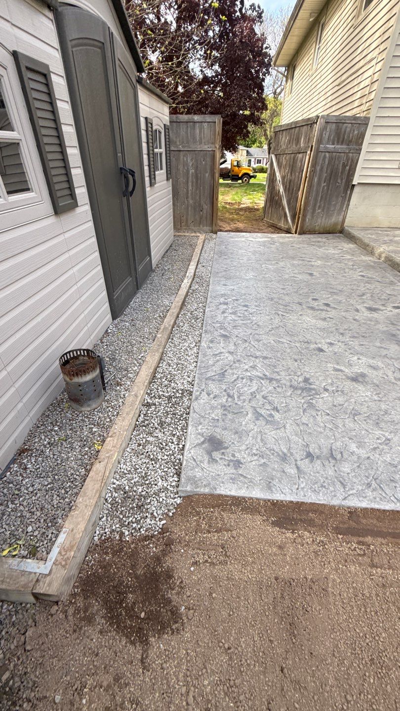 Oxford Slate Two Tiered Patio by NG Masonry & Construction LLC
