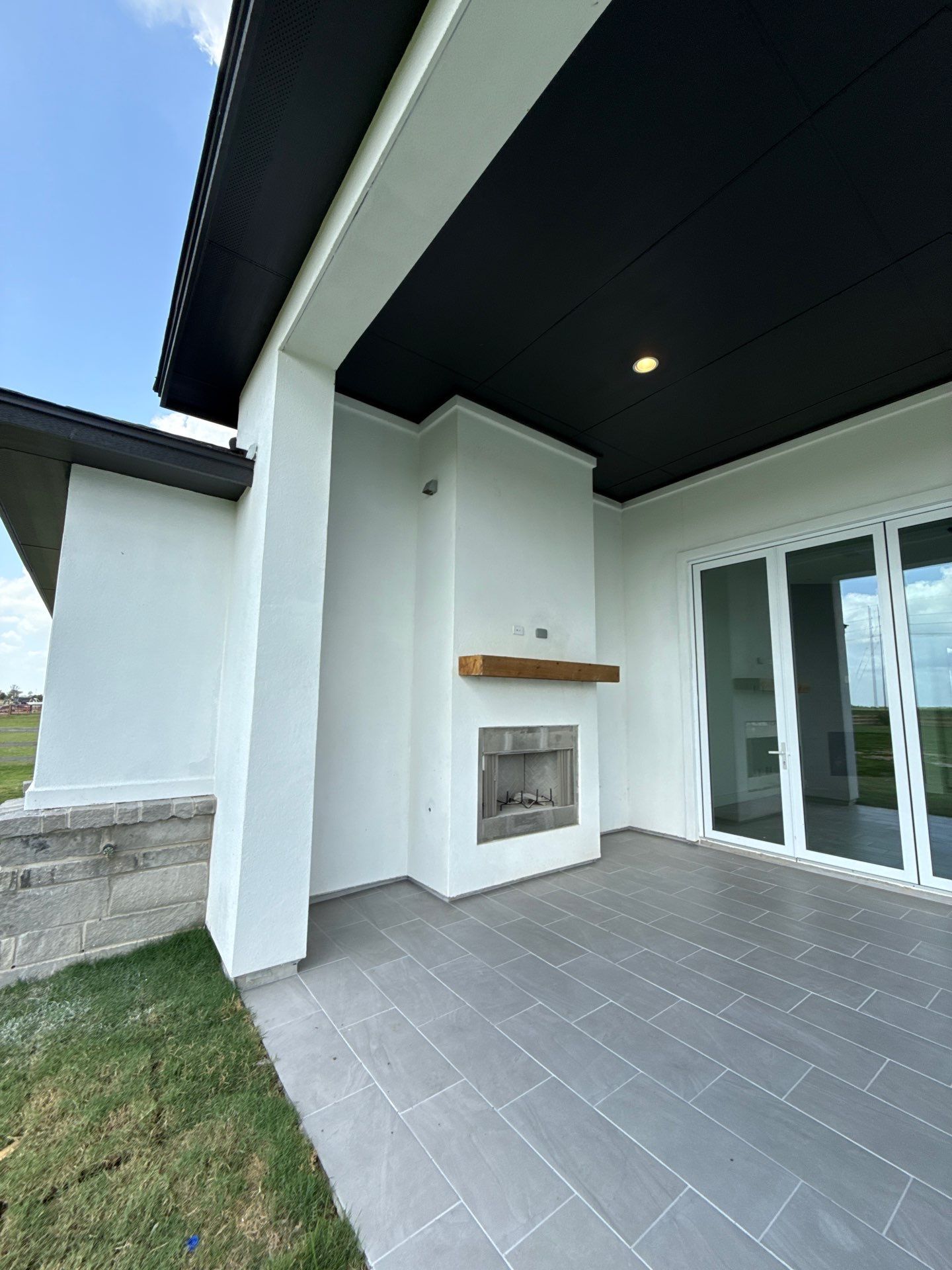 Waller Sophistication: Snowbound Color Stucco with Limestone Accents. by Apex Conventional Stucco Llc